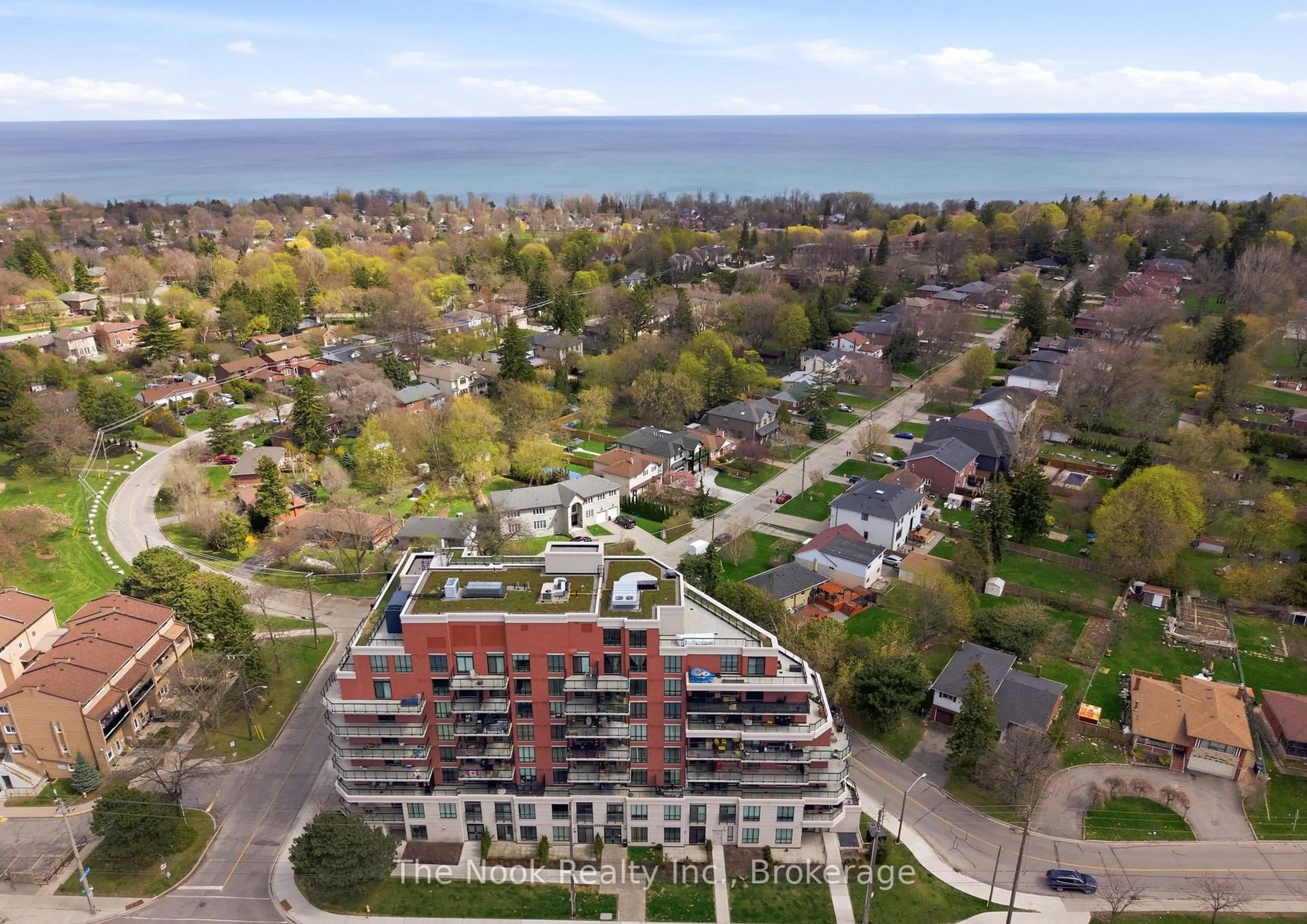 A pic from outside/outdoor area/front of a property/back of a property/a pic from drone, water/lake/river/ocean view for 3655 Kingston Rd #609, Toronto Ontario M1M 1S2