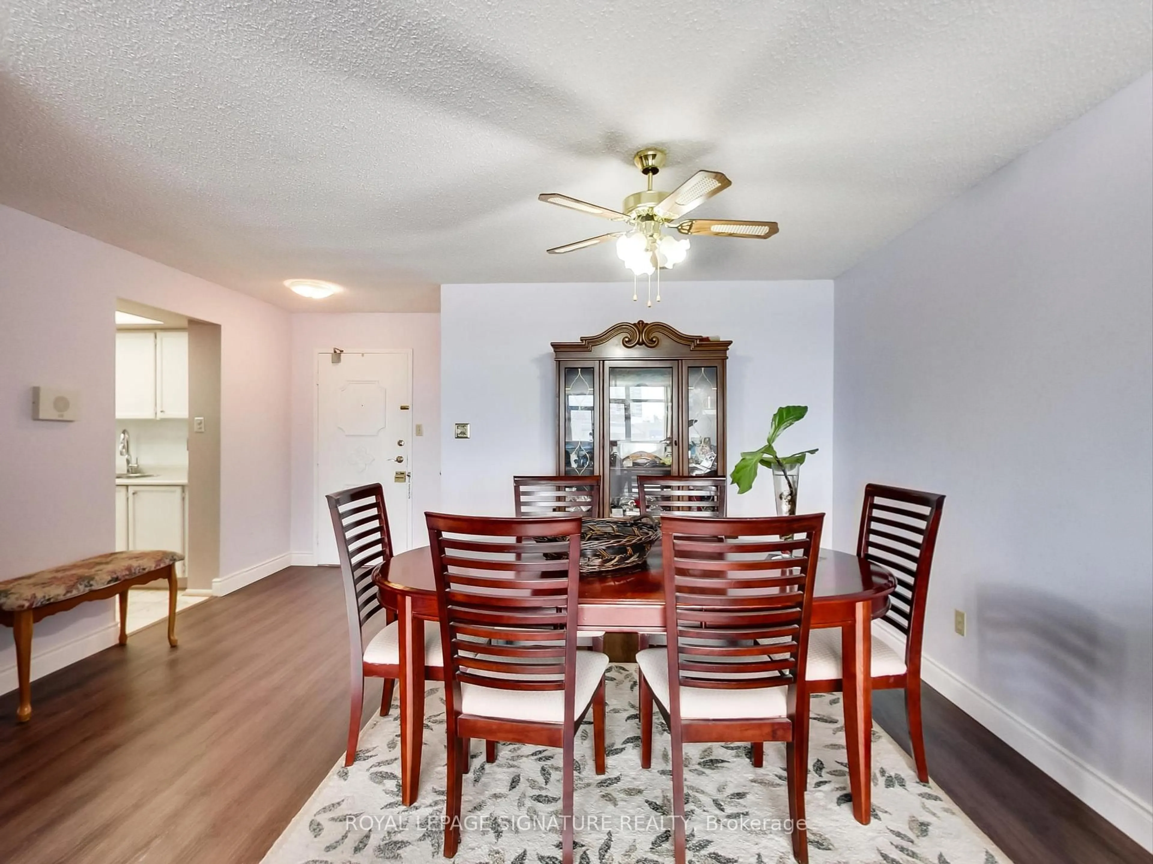 Dining room, wood/laminate floor for 3151 Bridletowne Circ #506, Toronto Ontario M1W 2T1