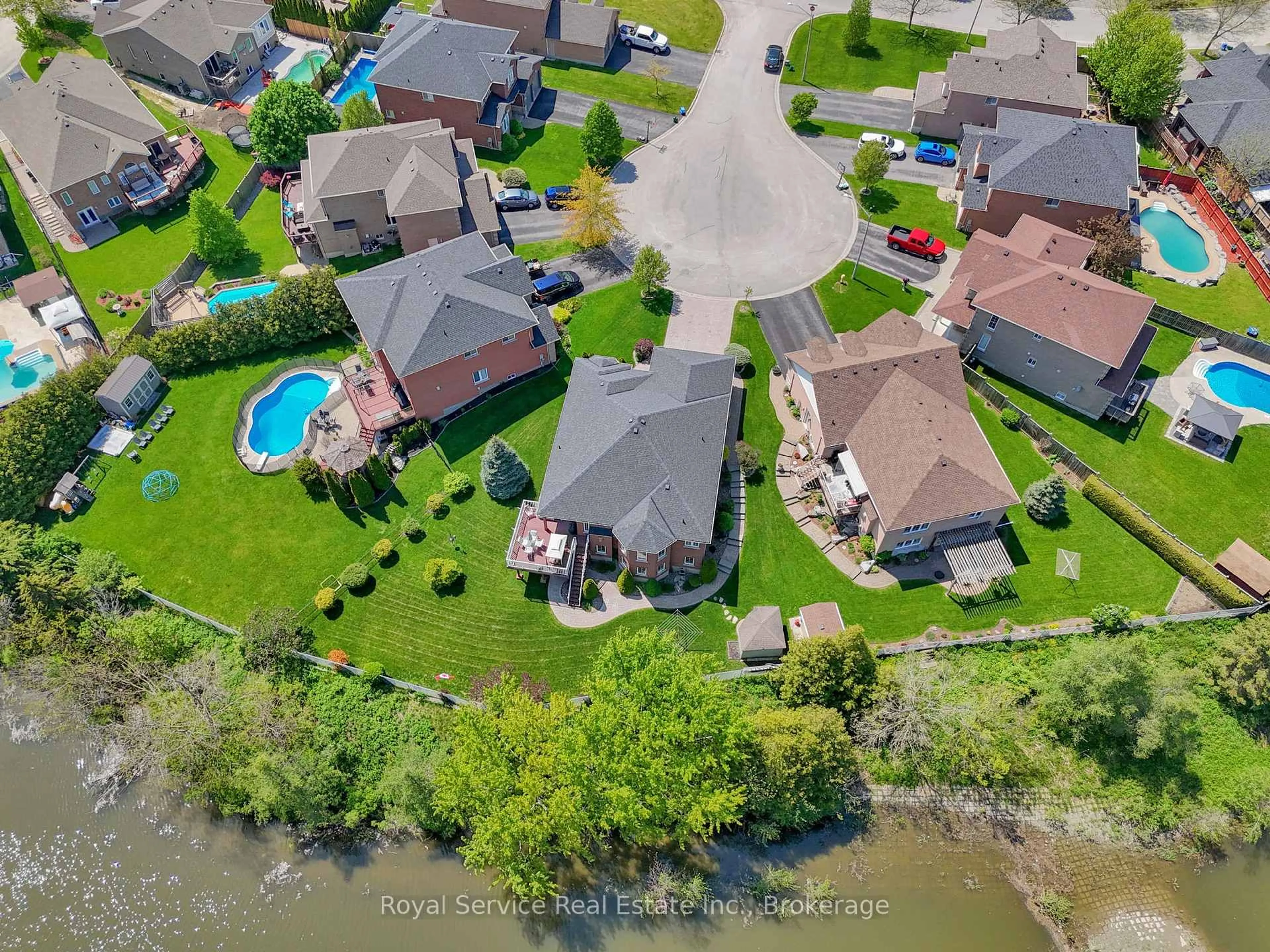 A pic from outside/outdoor area/front of a property/back of a property/a pic from drone, water/lake/river/ocean view for 18 Dolan Crt, Clarington Ontario L1C 5P7