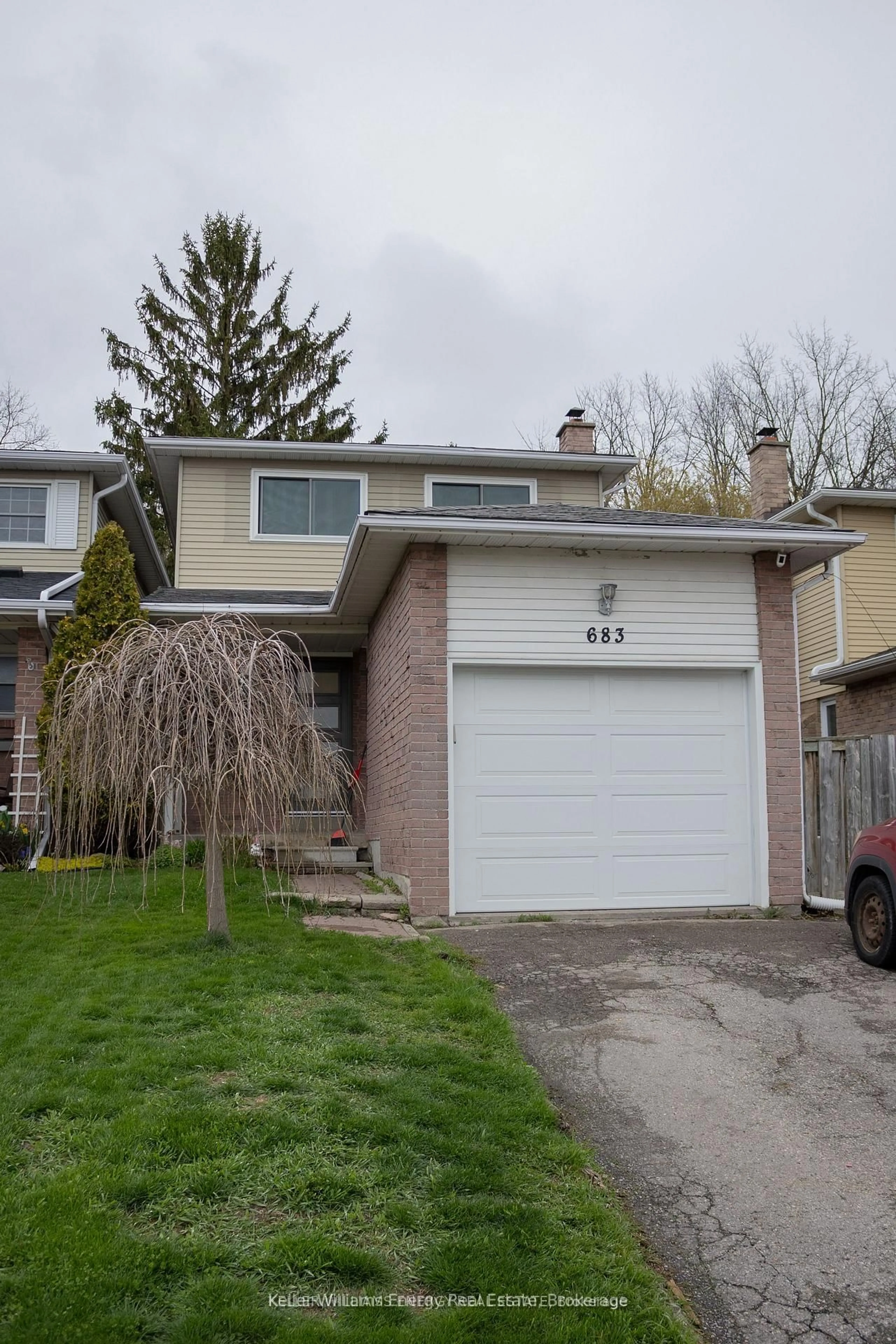 Home with vinyl exterior material, street for 683 Grandview Dr, Oshawa Ontario L1H 7V9