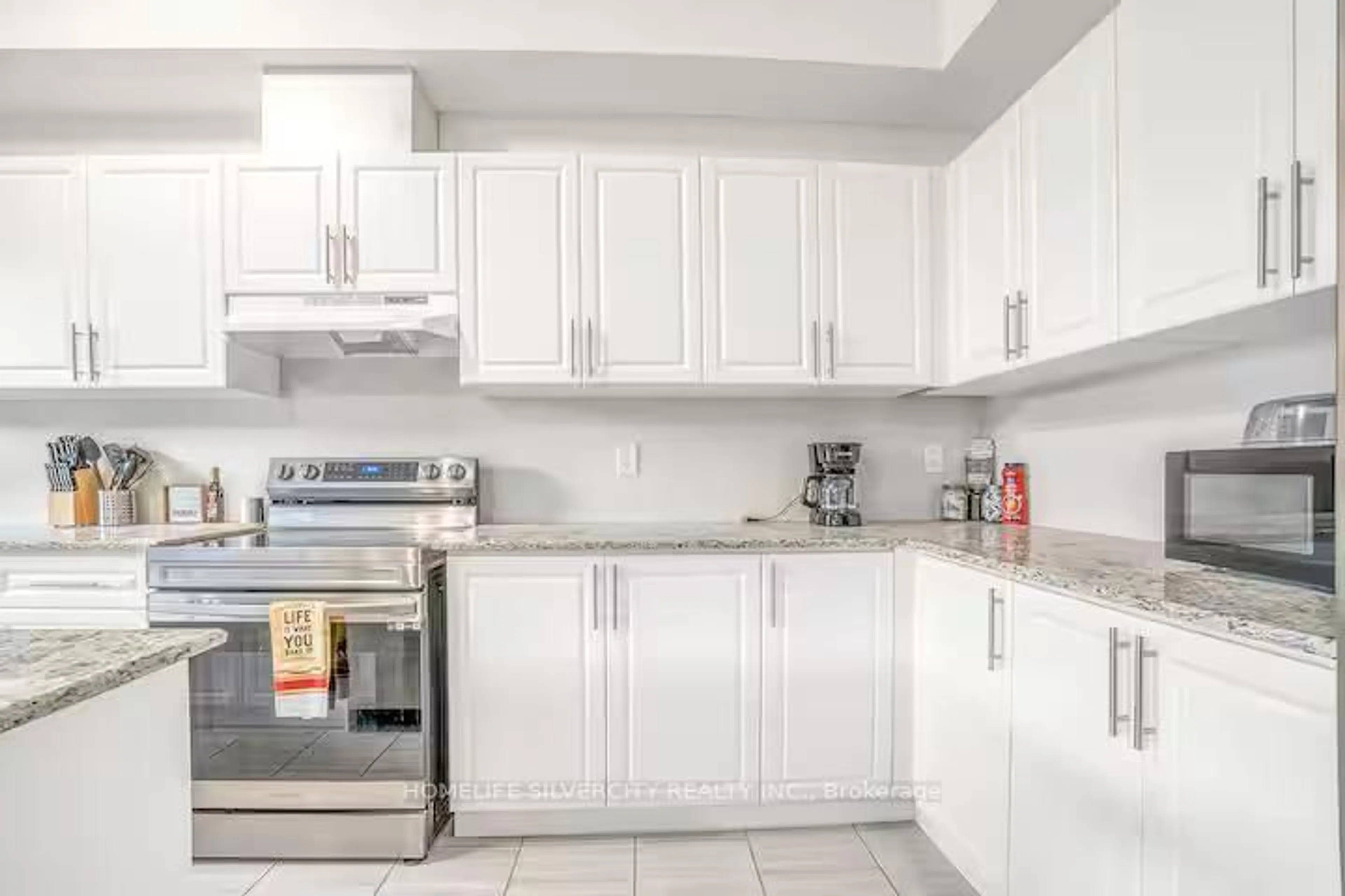 Standard kitchen, ceramic/tile floor for 43 Honey Crisp Lane, Clarington Ontario L1C 7H7
