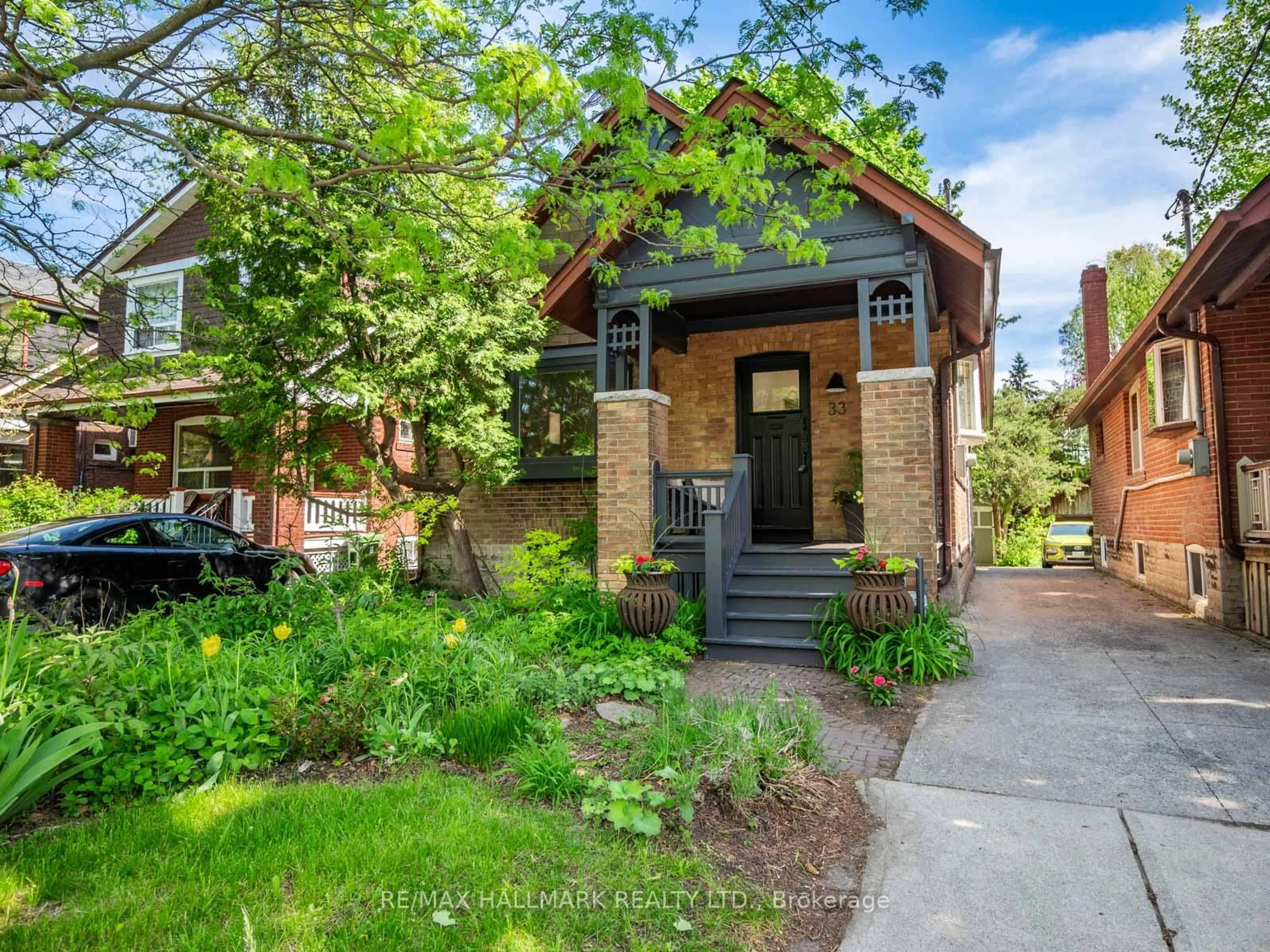 Home with brick exterior material, street for 33 Mortimer Ave, Toronto Ontario M4K 1Z9