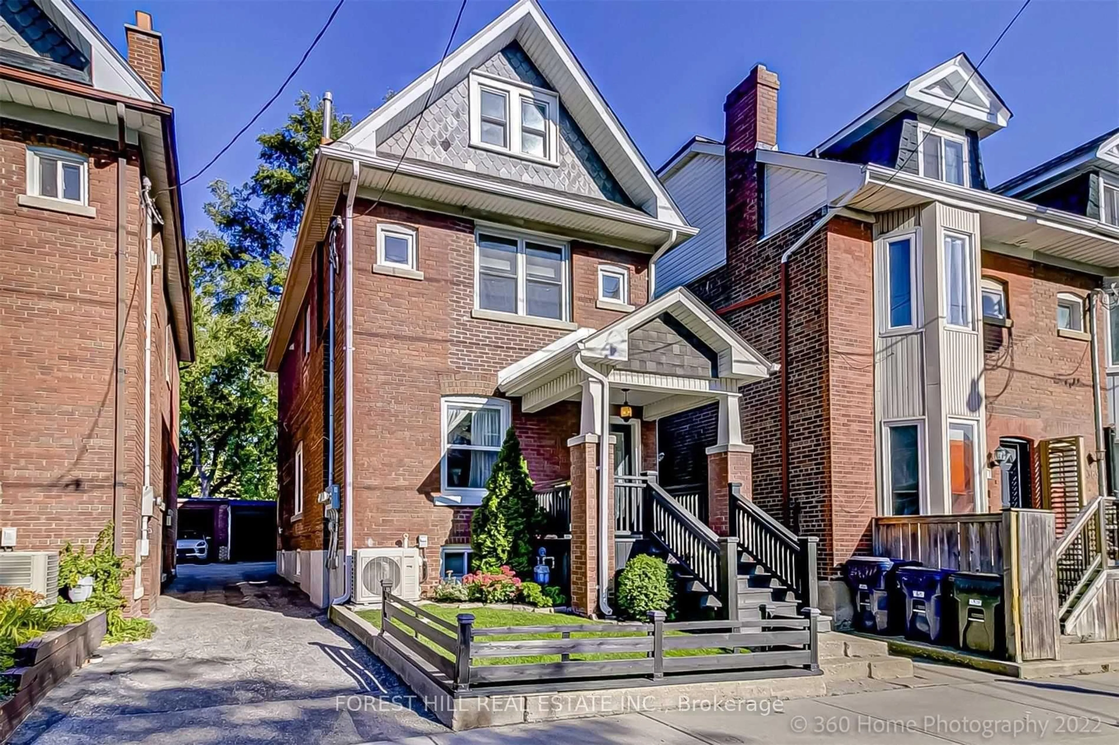 Home with brick exterior material, street for 373 Woodbine Ave, Toronto Ontario M4L 3P7