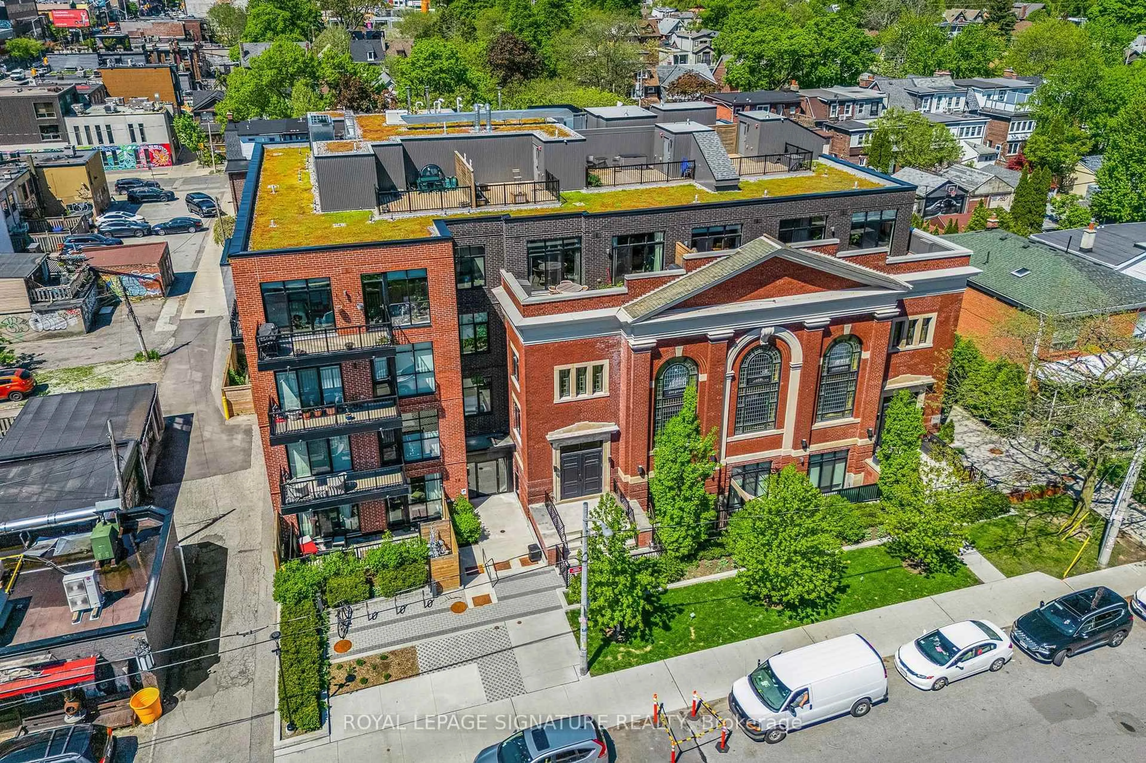 A pic from outside/outdoor area/front of a property/back of a property/a pic from drone, unknown for 14 Dewhurst Blvd #206, Toronto Ontario M4J 3H9