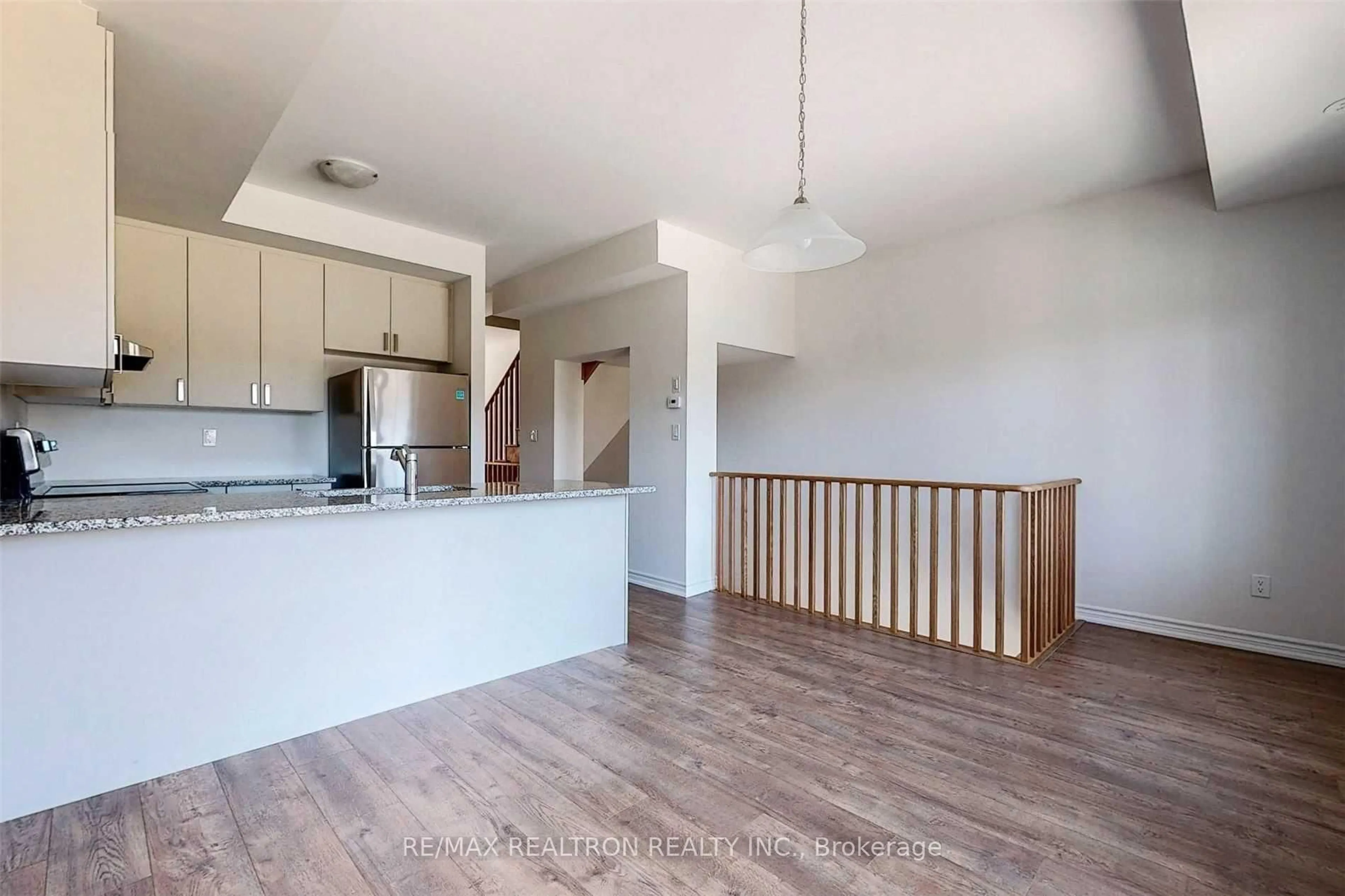 Open concept kitchen, wood/laminate floor for 203 Royal Northern Path #73, Oshawa Ontario L1L 0R6