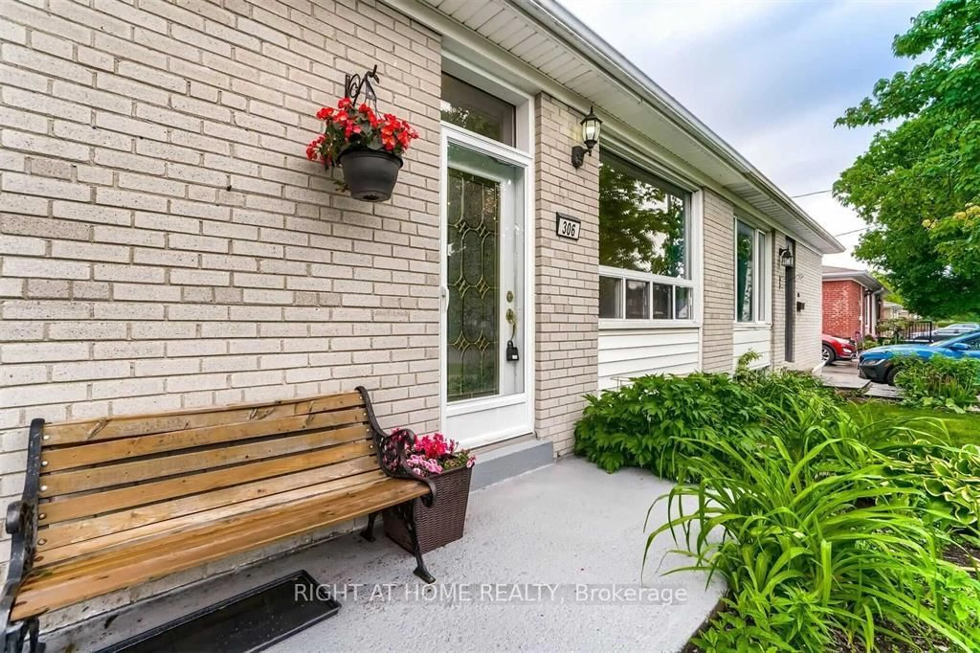 Home with brick exterior material, street for 306 Rosedale Dr, Whitby Ontario L1N 1Z3