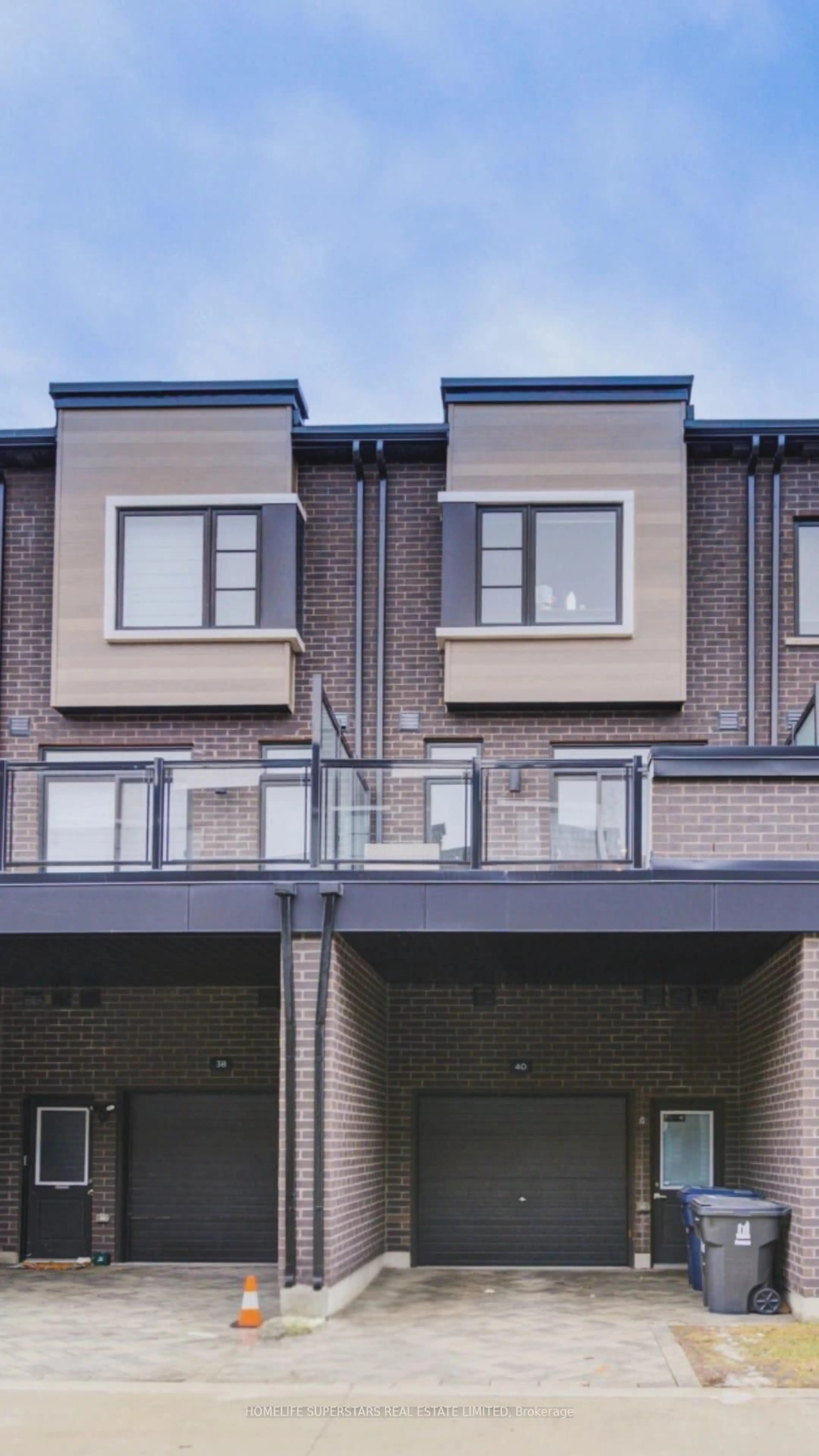 Home with brick exterior material, street for 40 Akil Thomas Gdns, Toronto Ontario M1P 0G3