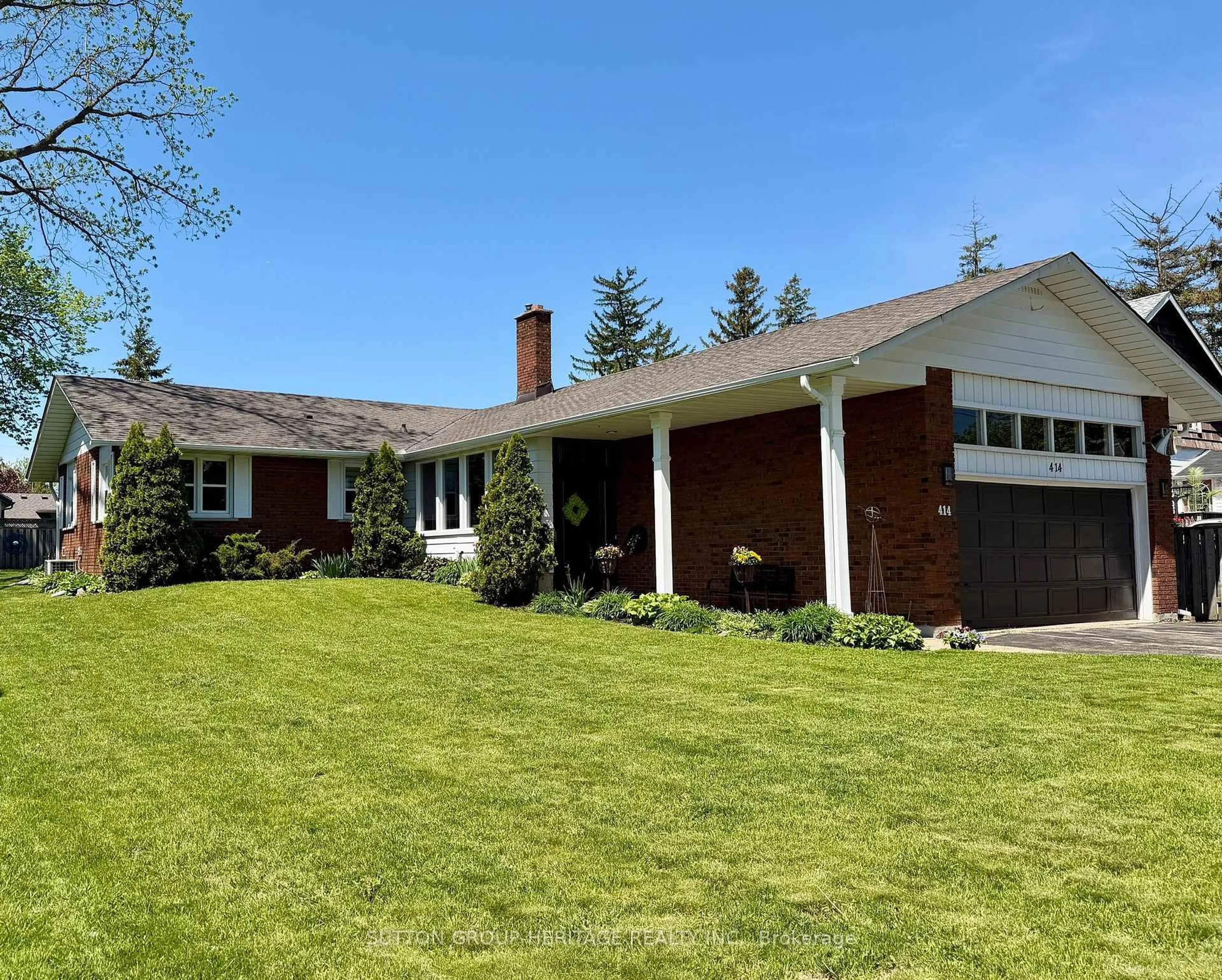 Home with brick exterior material, street for 414 Centre St, Whitby Ontario L1N 4T4
