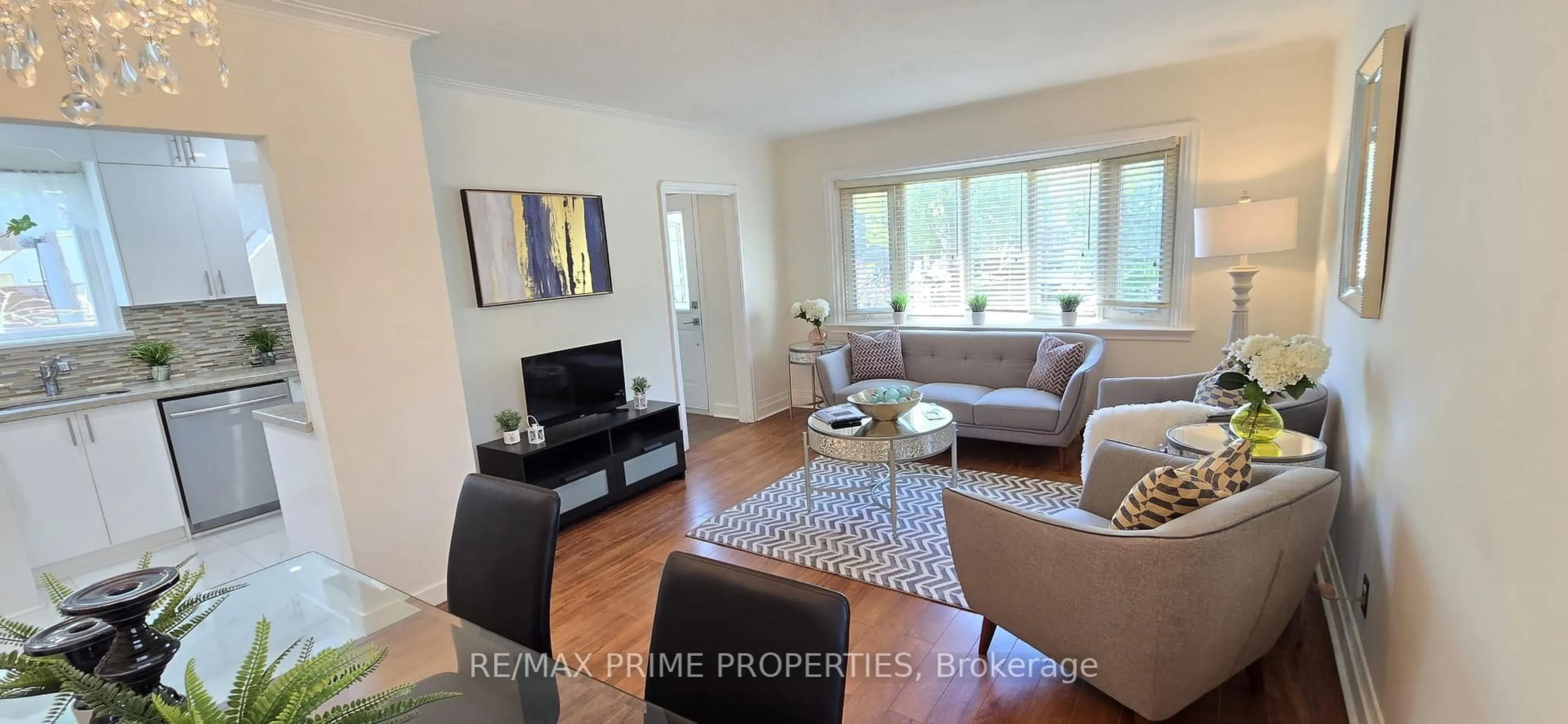 Living room with furniture, wood/laminate floor for 3 Timgren Dr, Toronto Ontario M1R 3R4
