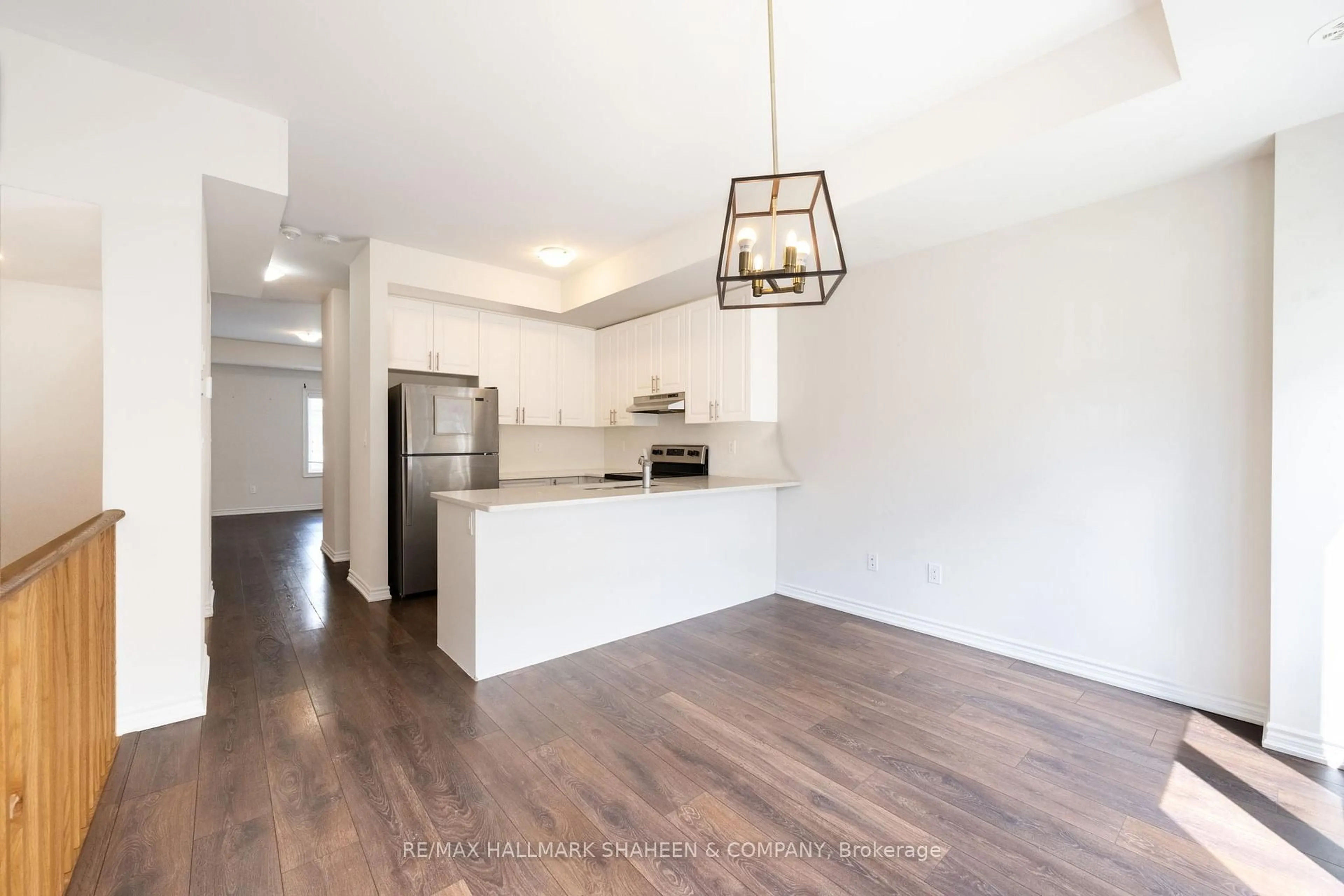 Open concept kitchen, wood/laminate floor for 2553 Barbarolli Path #116, Oshawa Ontario L1L 0P9