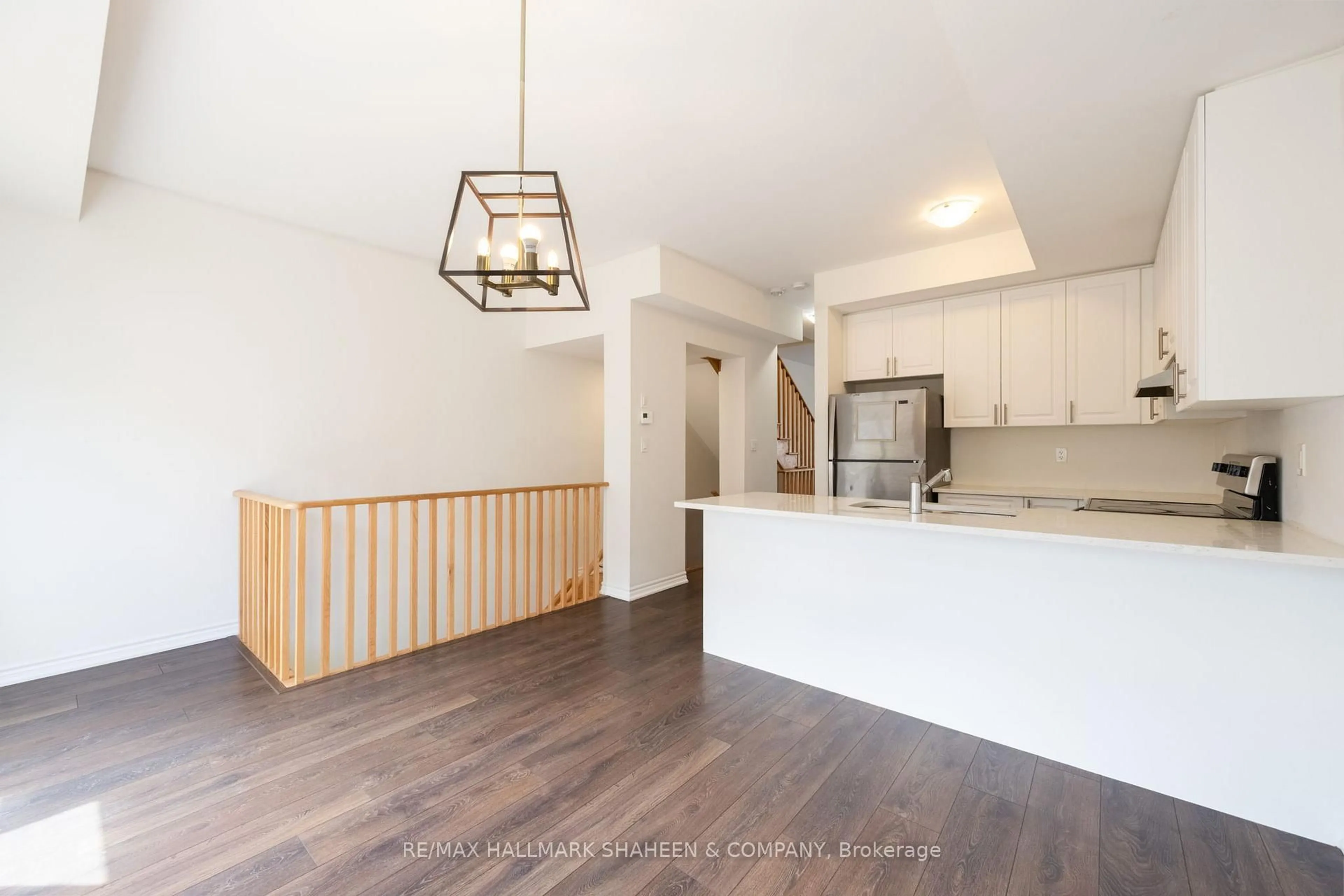 Open concept kitchen, wood/laminate floor for 2553 Barbarolli Path #116, Oshawa Ontario L1L 0P9