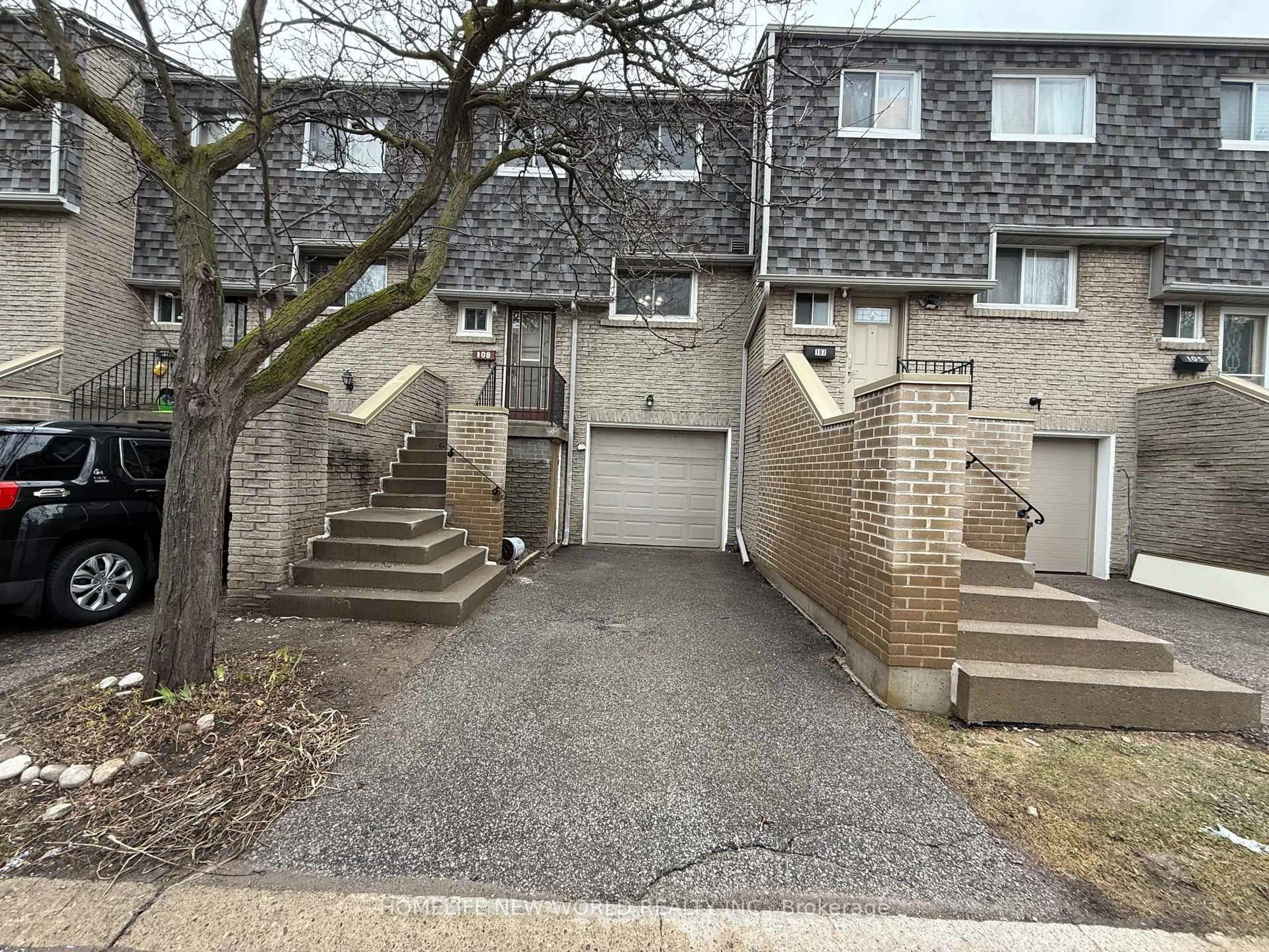 A pic from outside/outdoor area/front of a property/back of a property/a pic from drone, street for 1280 Bridletowne Circ #109, Toronto Ontario M1W 2V4