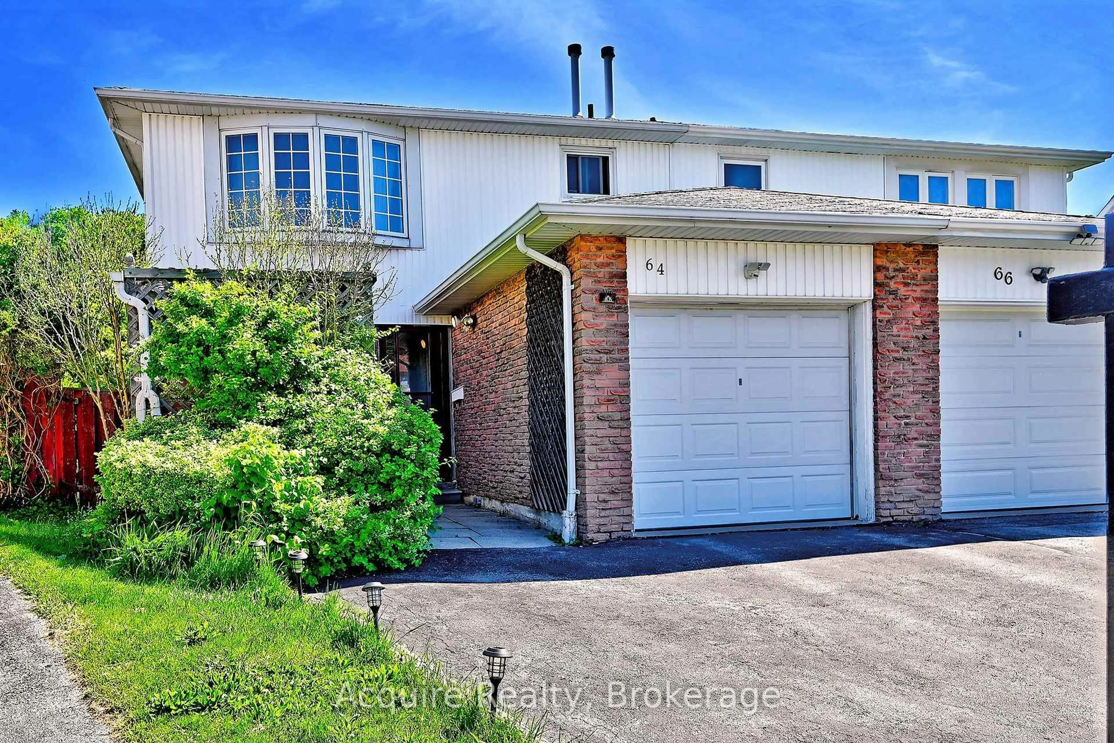 Home with brick exterior material, street for 64 Bushmills Sq, Toronto Ontario M1V 1J4