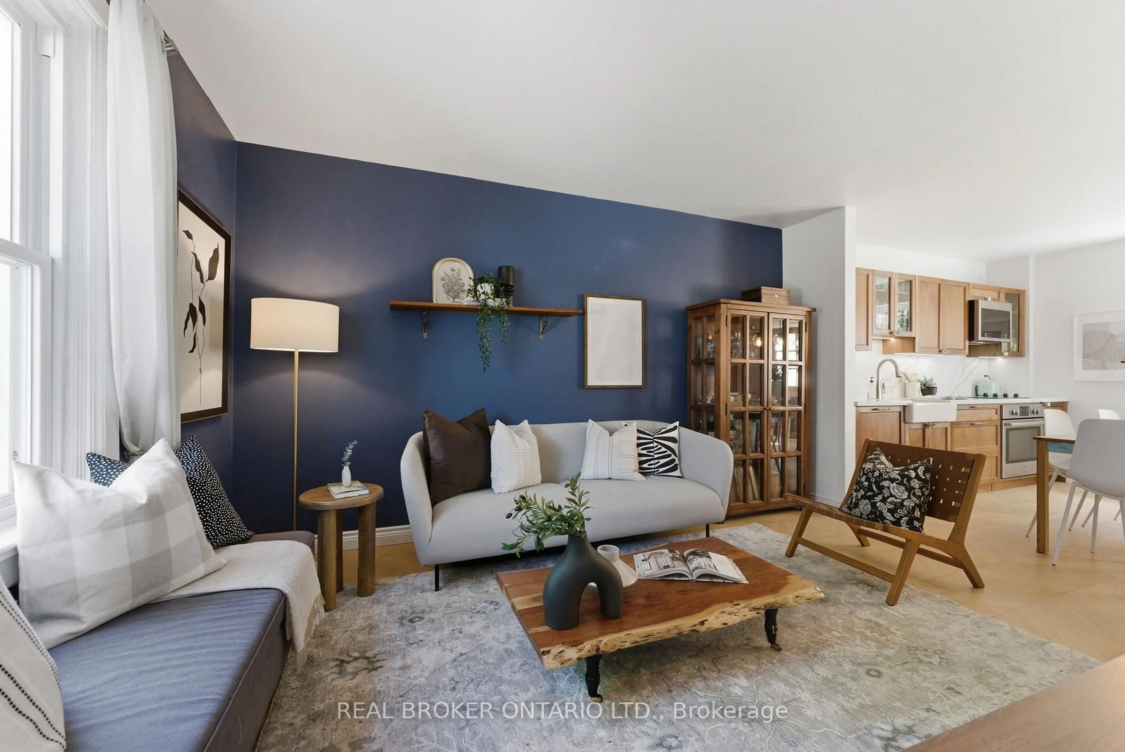 Living room with furniture, unknown for 833 Sammon Ave, Toronto Ontario M4C 2E7