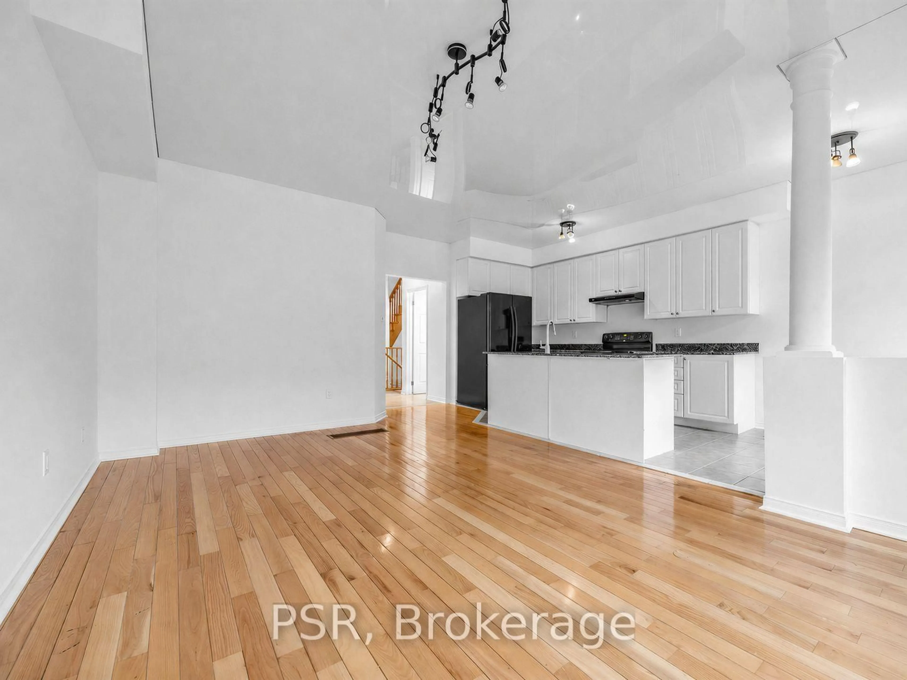 Open concept kitchen, wood/laminate floor for 38 Enroutes St, Toronto Ontario M4E 3X8