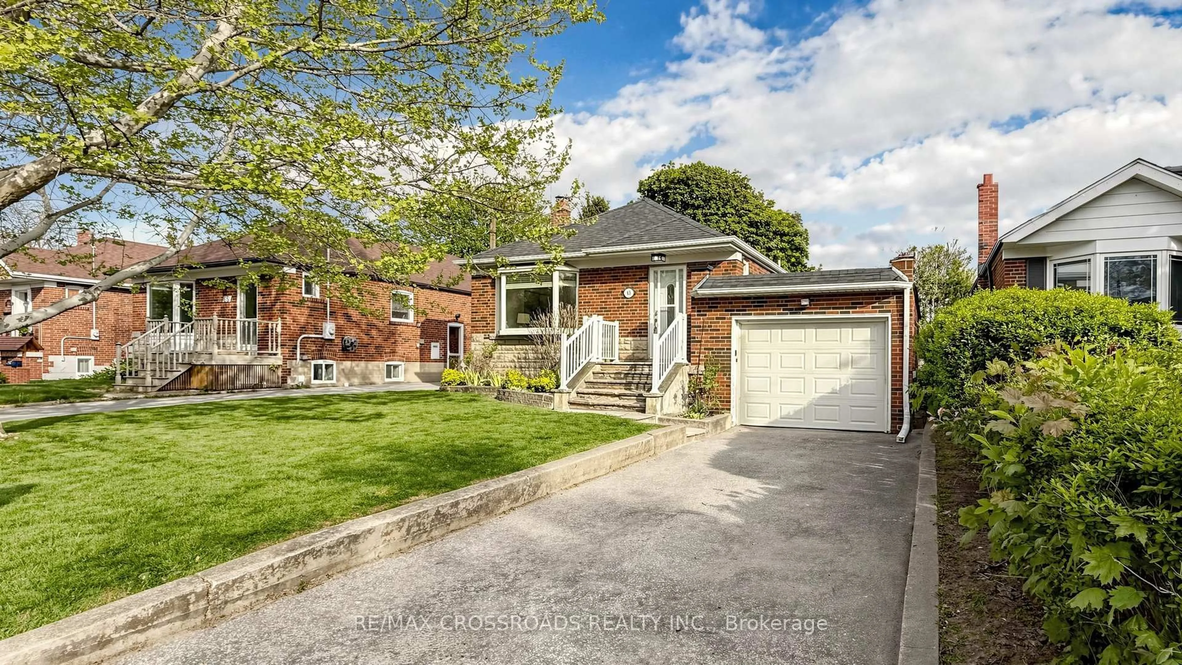 Home with brick exterior material, street for 63 Flora Dr, Toronto Ontario M1P 1A5