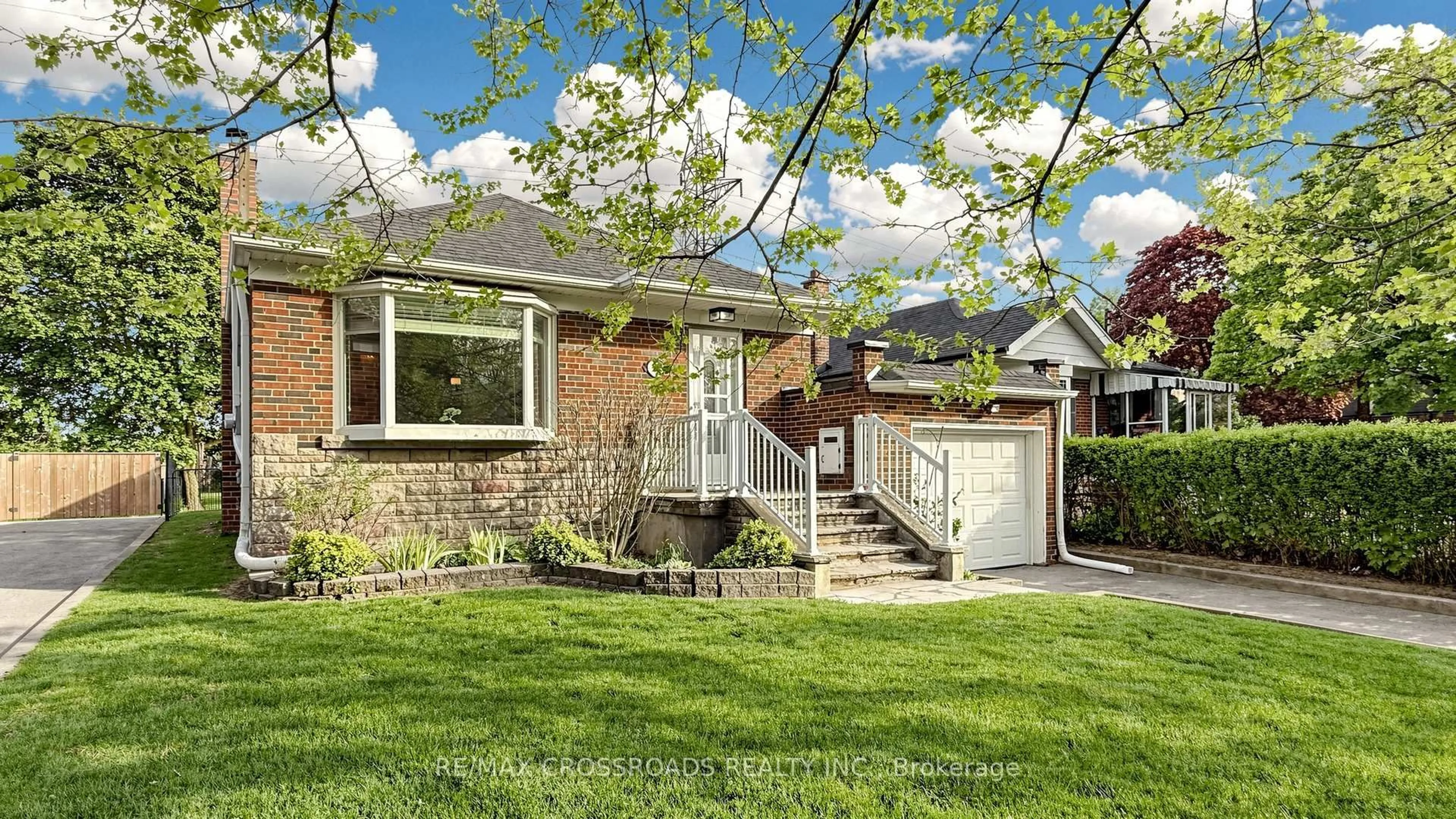 Home with brick exterior material, street for 63 Flora Dr, Toronto Ontario M1P 1A5