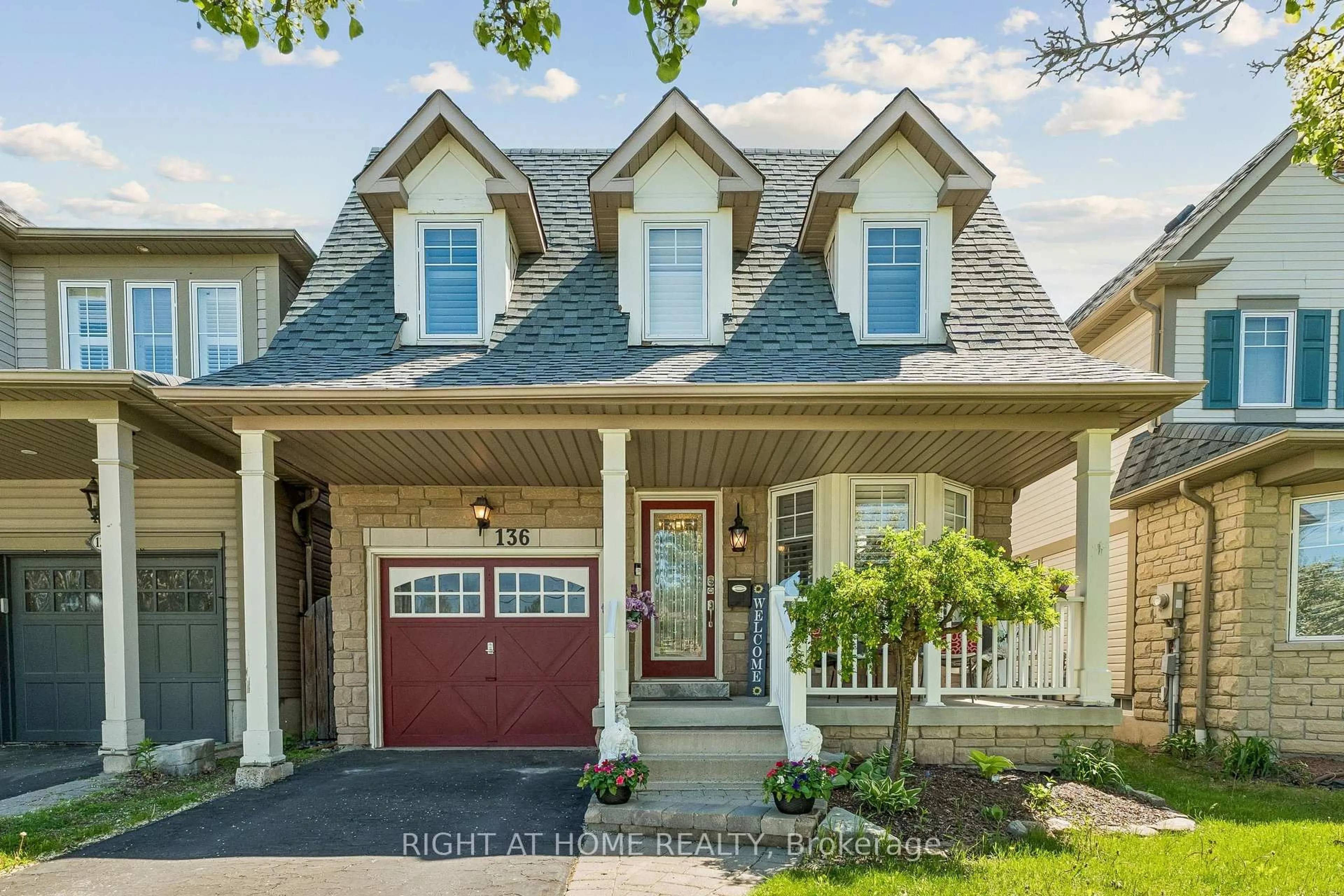 Home with brick exterior material, street for 136 Harrongate Pl, Whitby Ontario L1R 3E5
