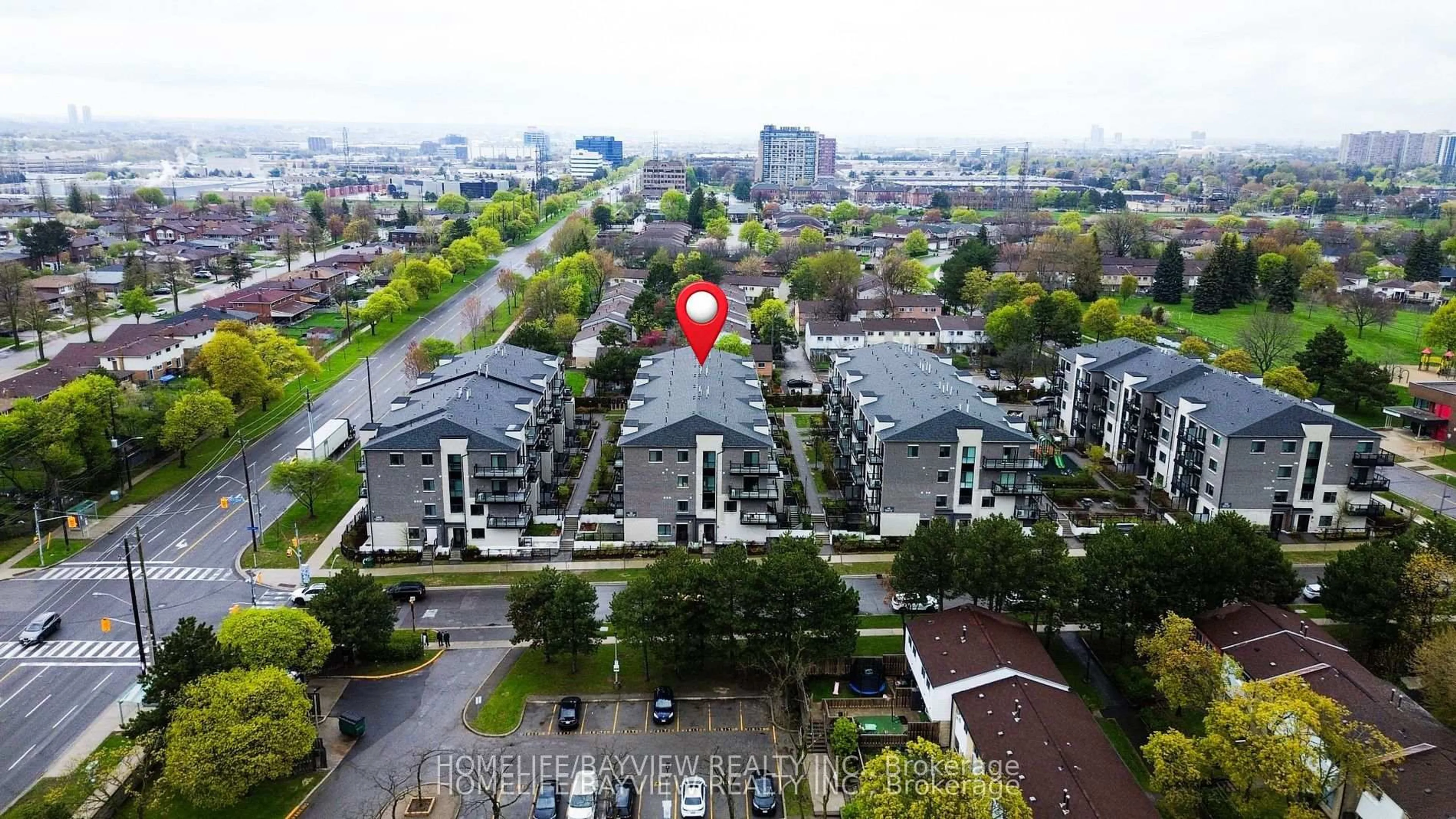 A pic from outside/outdoor area/front of a property/back of a property/a pic from drone, city buildings view from balcony for 50 Morecambe Gate #B108, Toronto Ontario M1W 2N5