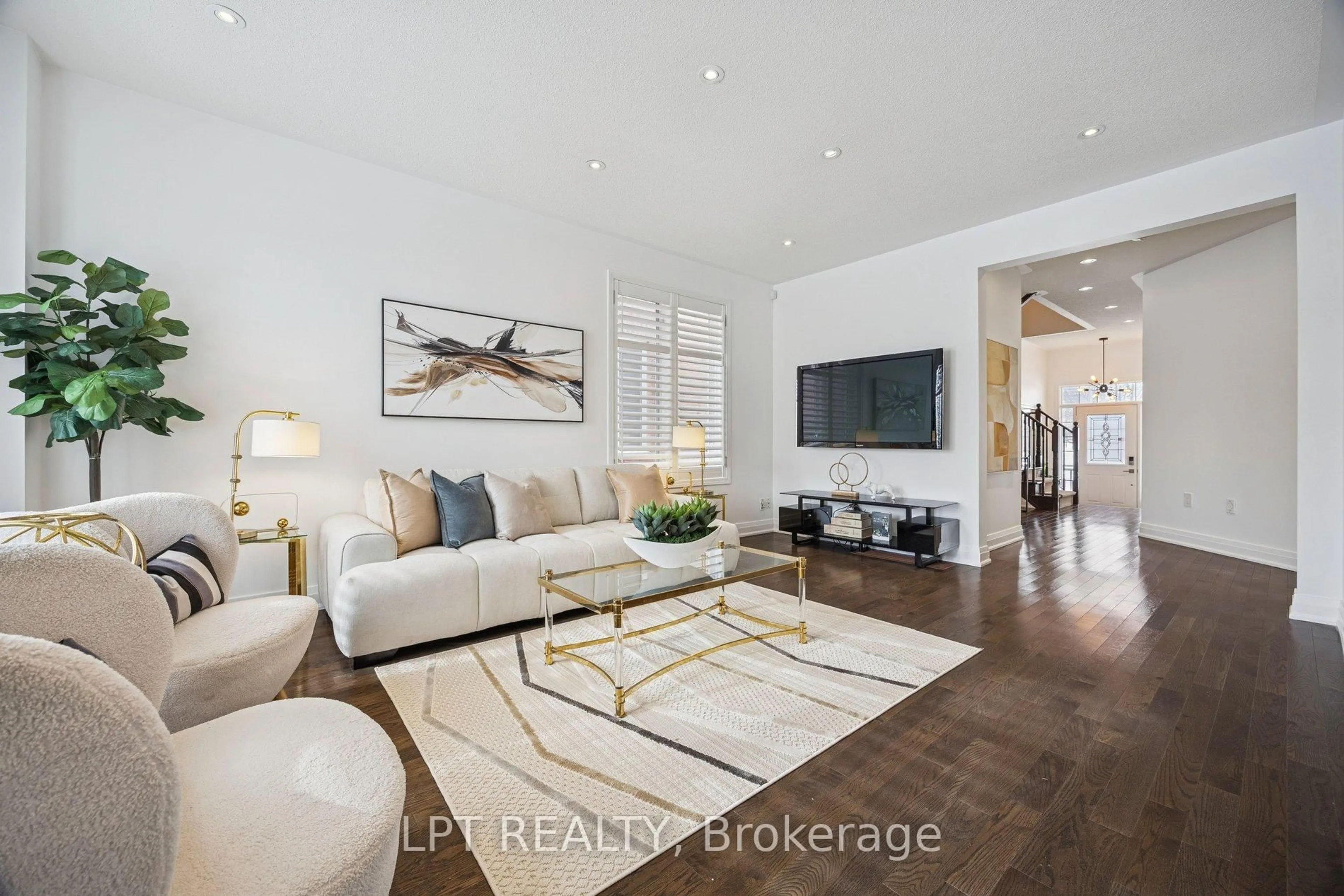 Living room with furniture, wood/laminate floor for 61 Minerva Ave, Toronto Ontario M1M 0C2