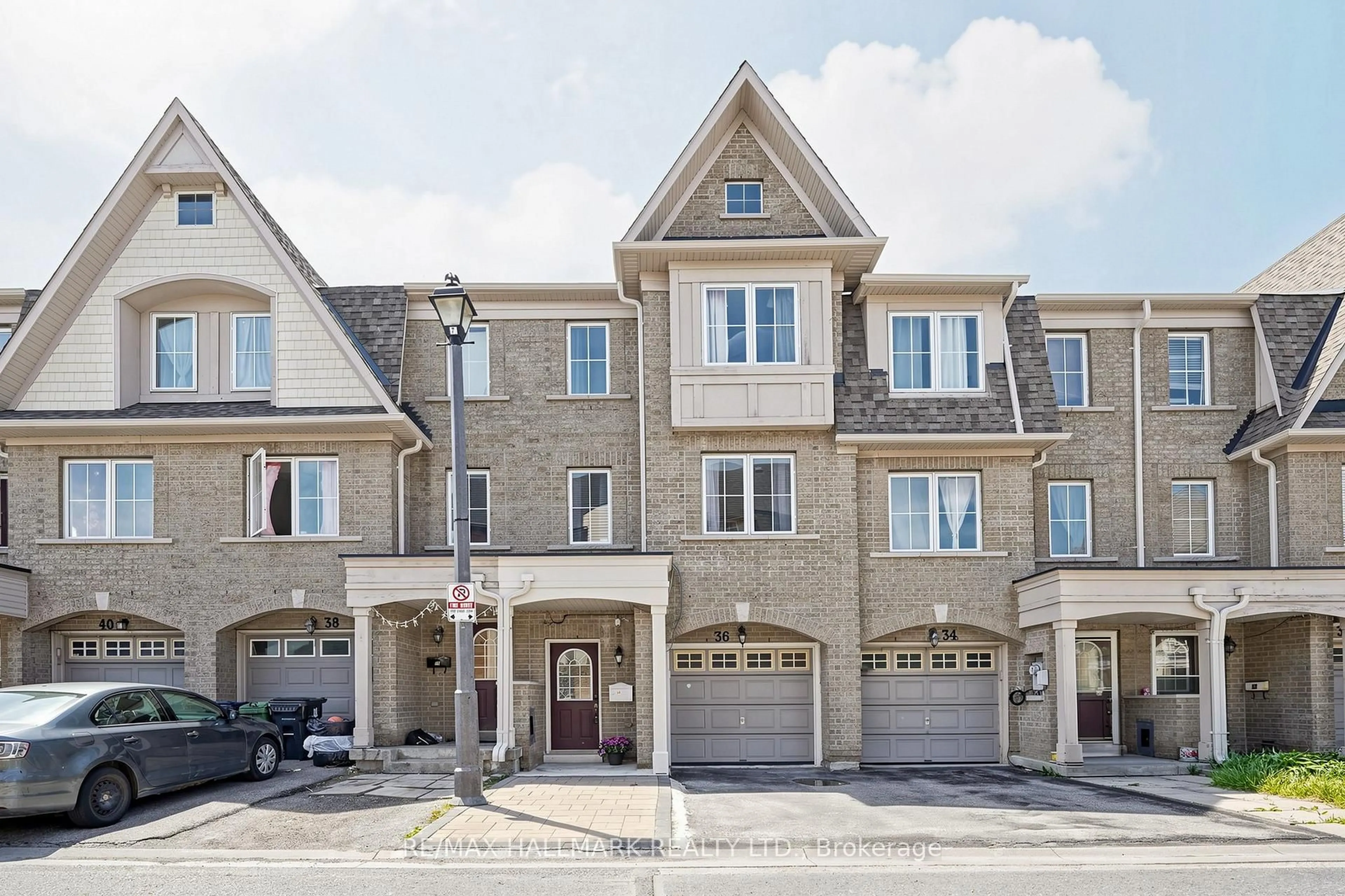 Home with brick exterior material, street for 36 Jenkinson Way #132, Toronto Ontario M1P 5H4