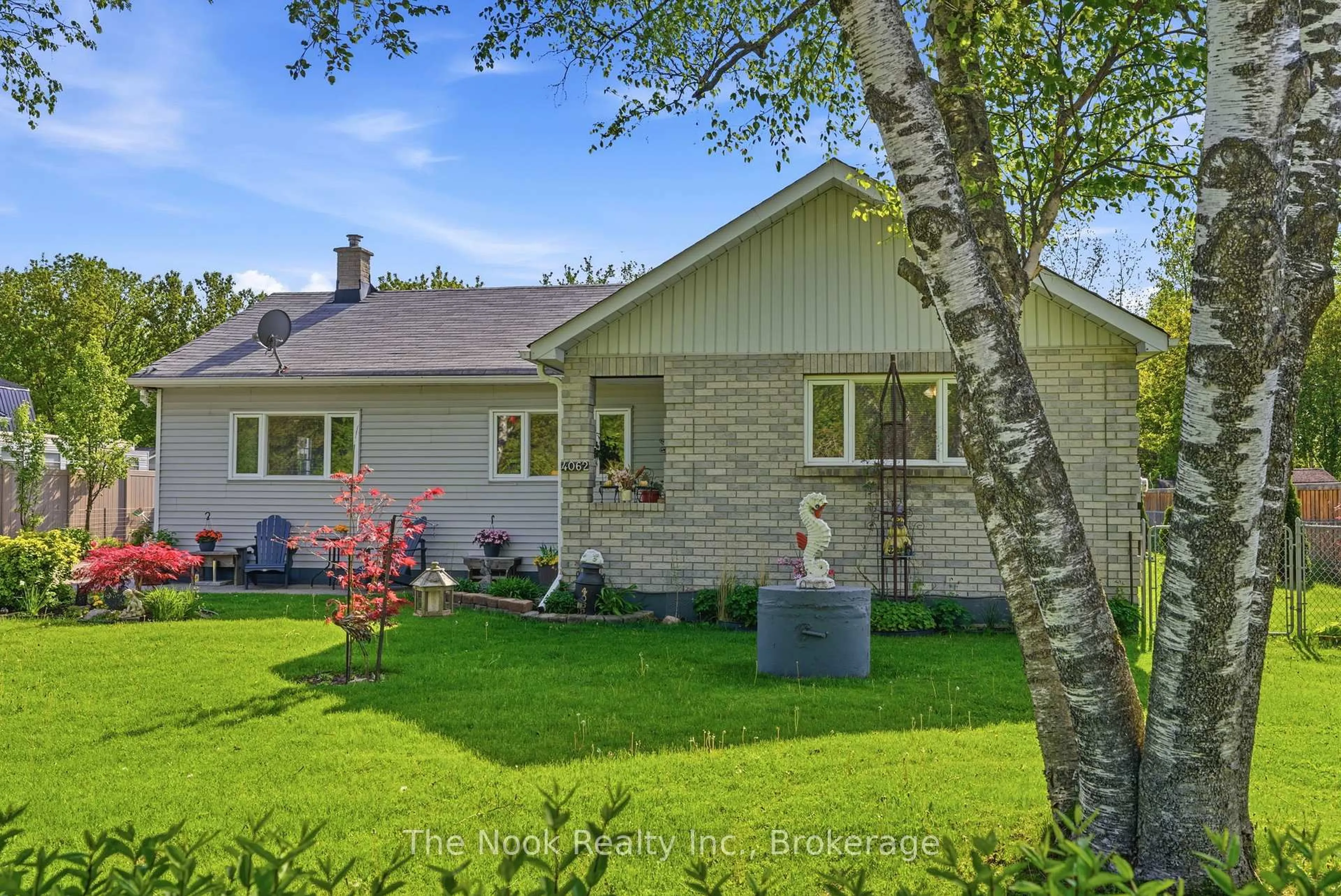Home with vinyl exterior material, street for 4062 Courtice Rd, Clarington Ontario L1E 0K8