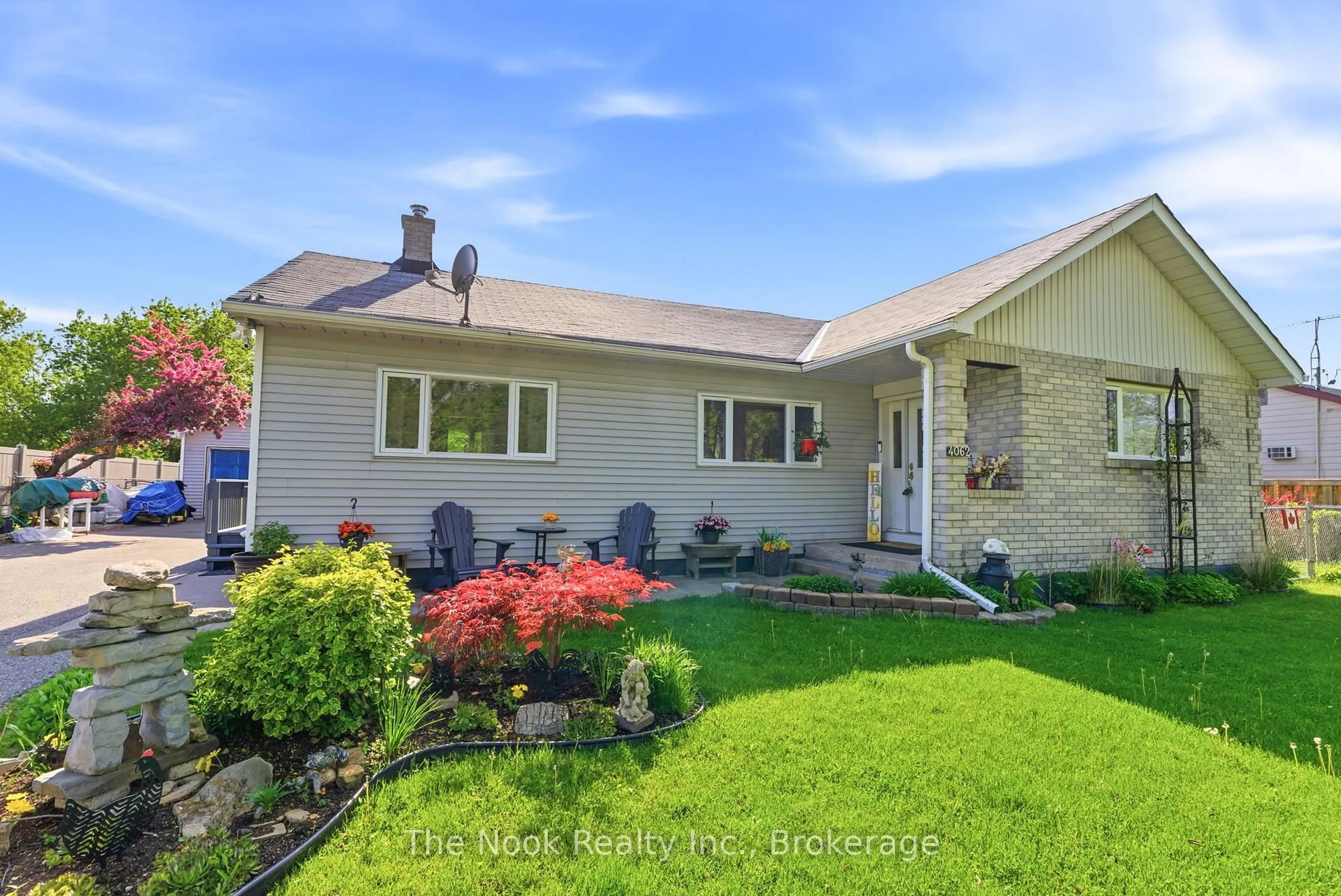 Home with vinyl exterior material, street for 4062 Courtice Rd, Clarington Ontario L1E 0K8