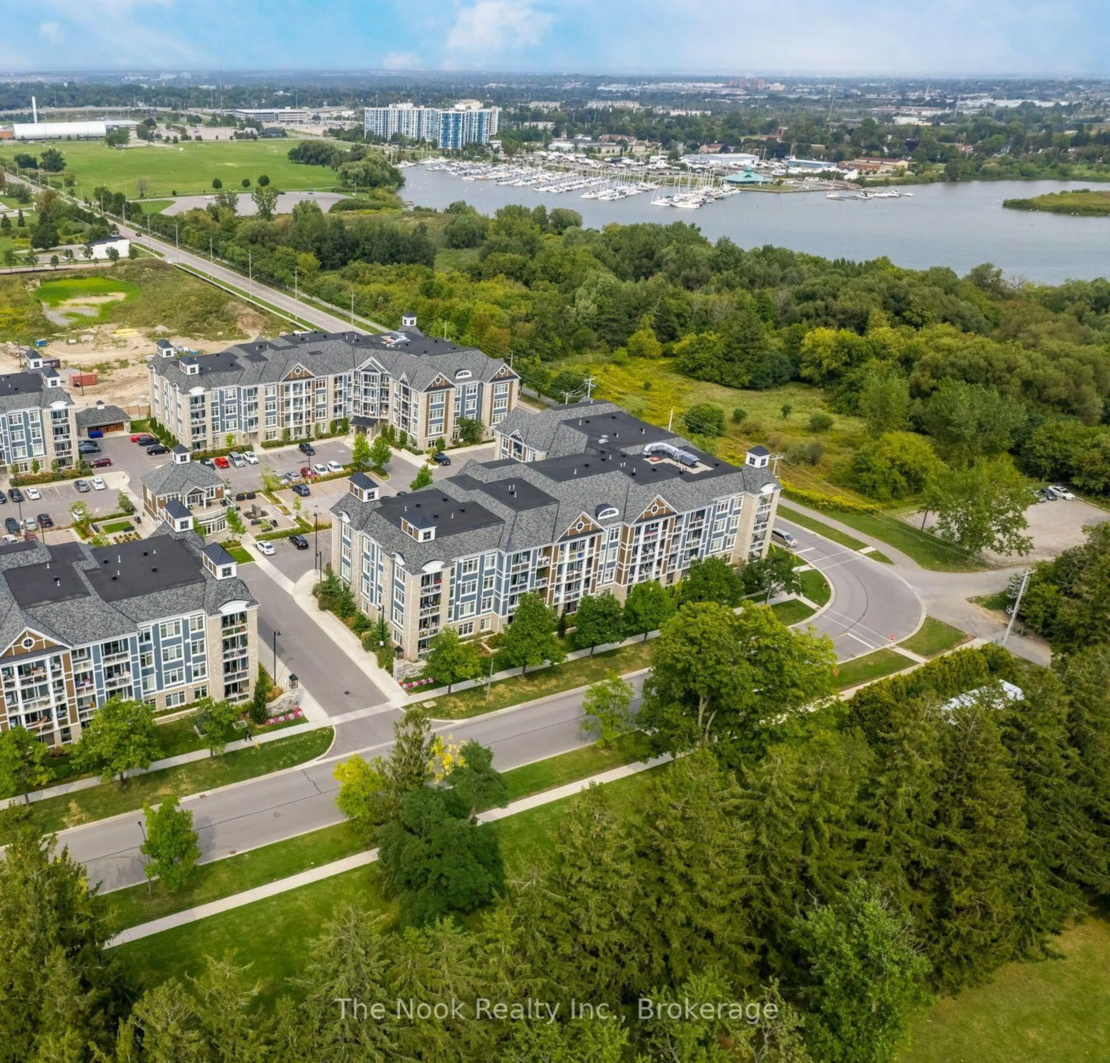 A pic from outside/outdoor area/front of a property/back of a property/a pic from drone, water/lake/river/ocean view for 670 Gordon St #101, Whitby Ontario L1N 0K9