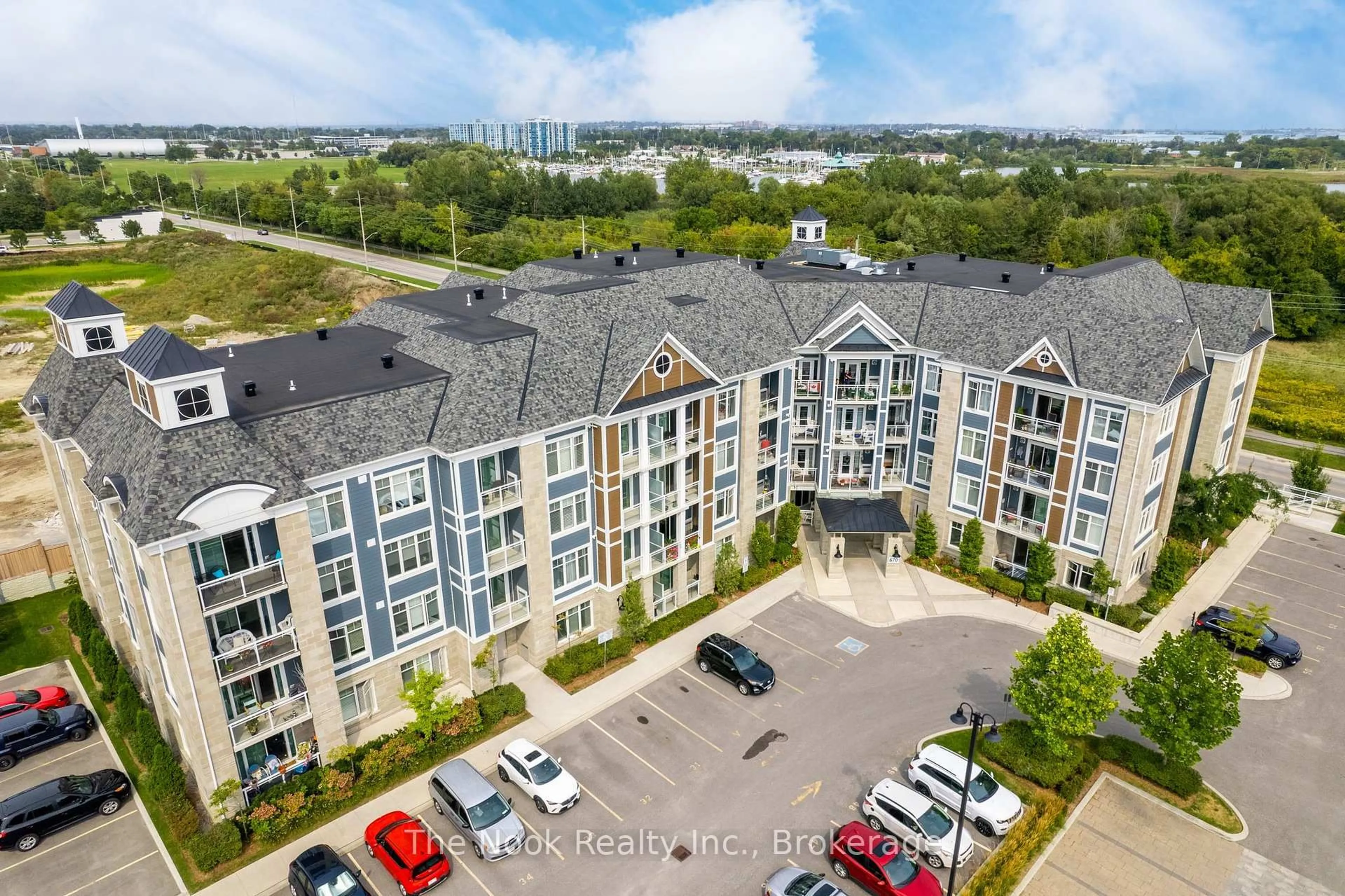 A pic from outside/outdoor area/front of a property/back of a property/a pic from drone, city buildings view from balcony for 670 Gordon St #101, Whitby Ontario L1N 0K9