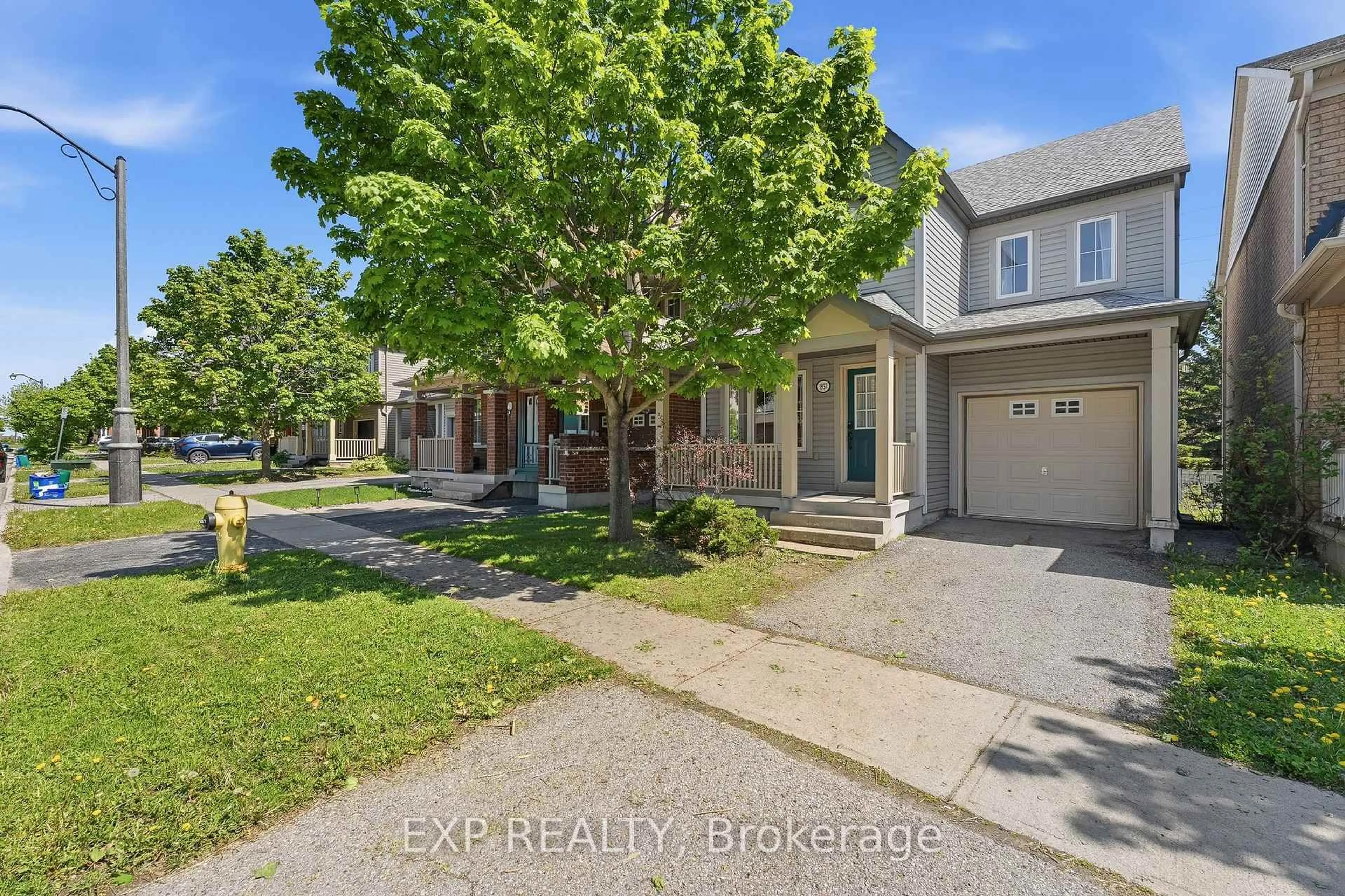 A pic from outside/outdoor area/front of a property/back of a property/a pic from drone, street for 1957 Secretariat Pl, Oshawa Ontario L1L 1C7