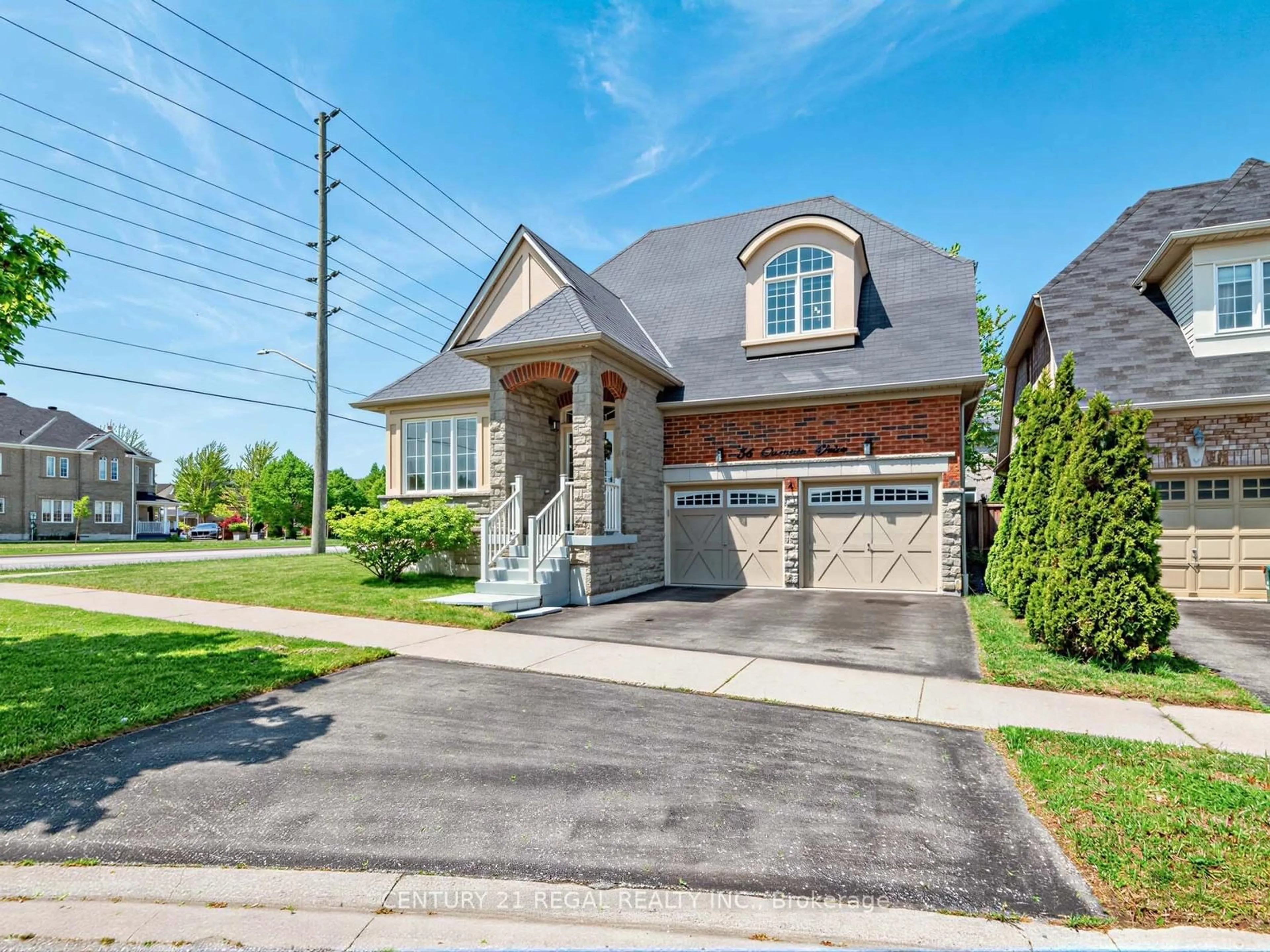 Home with brick exterior material, street for 56 Gamble Dr, Ajax Ontario L1Z 0G8