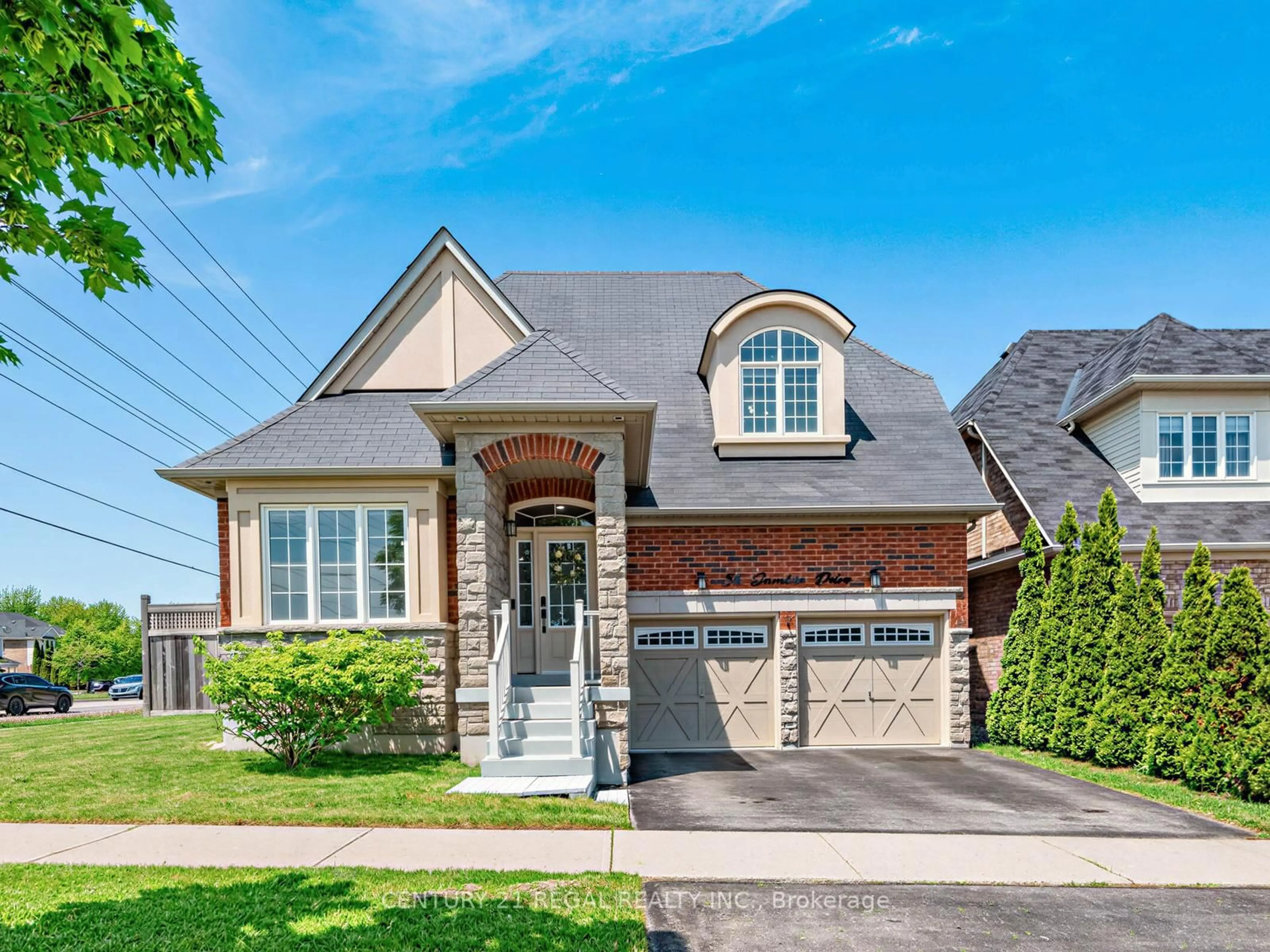 Home with brick exterior material, street for 56 Gamble Dr, Ajax Ontario L1Z 0G8