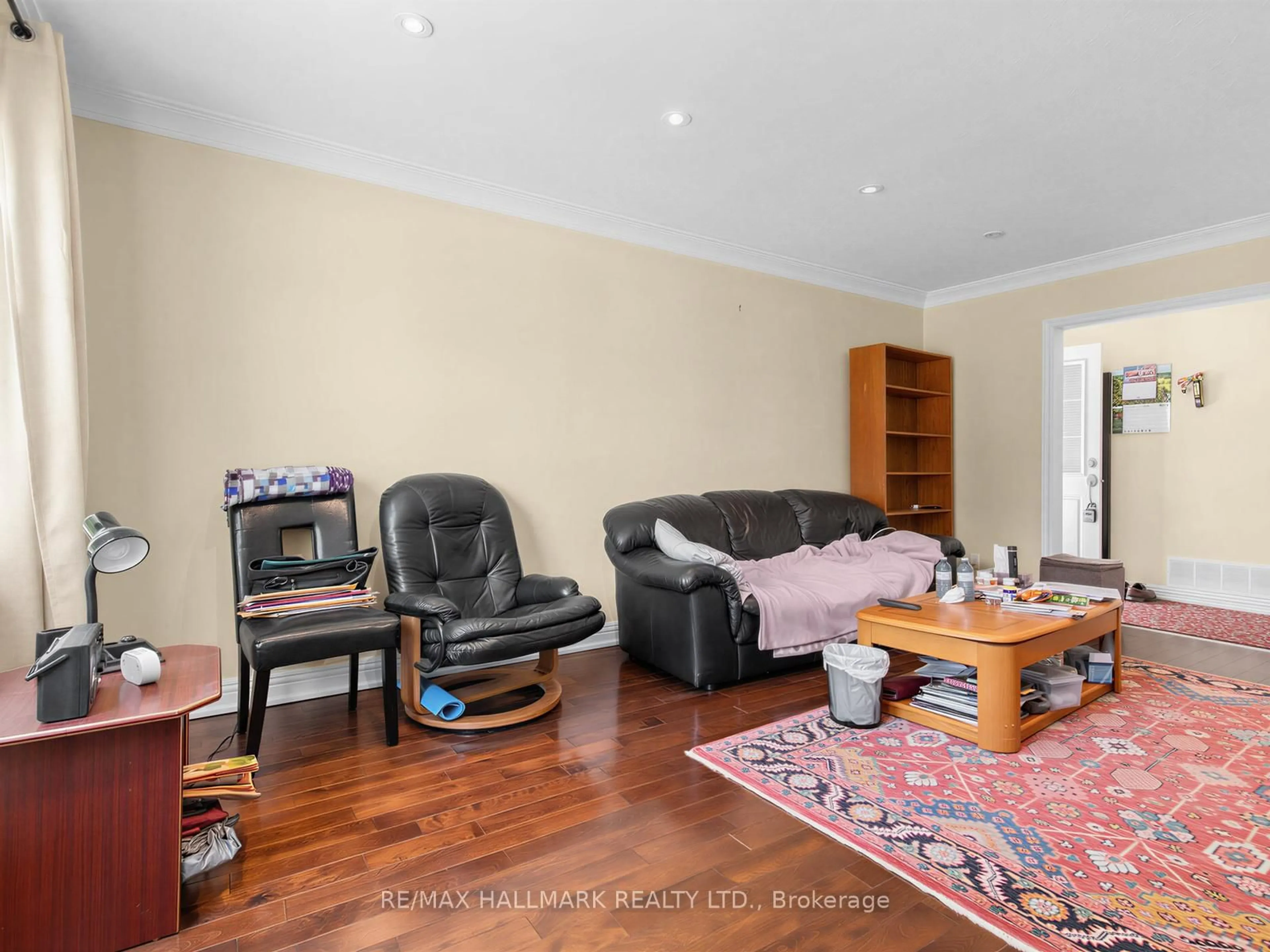 Living room with furniture, wood/laminate floor for 34 Greylawn Cres, Toronto Ontario M1R 2V6