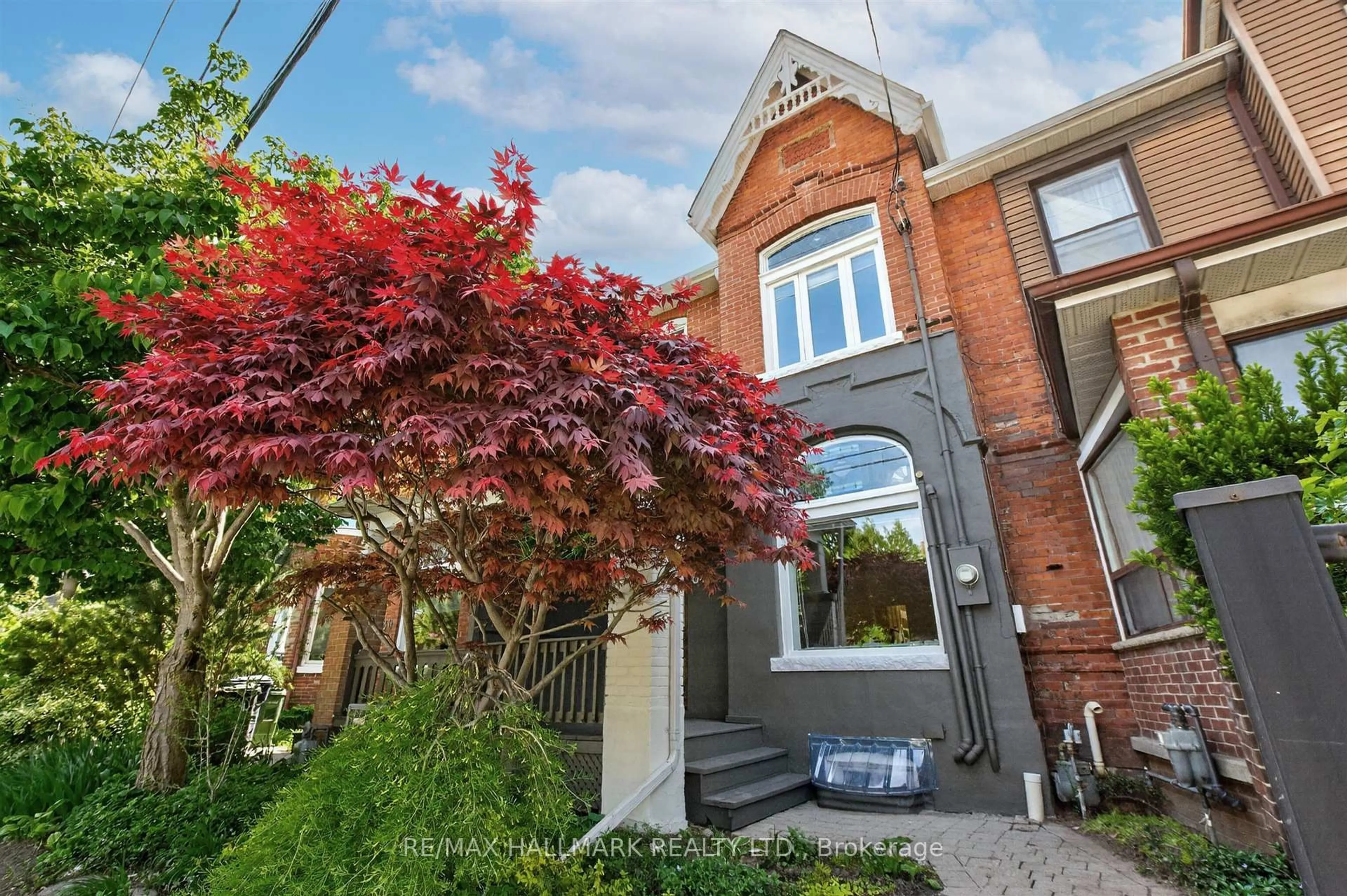 Home with brick exterior material, street for 82 Dawes Rd, Toronto Ontario M4C 5B3