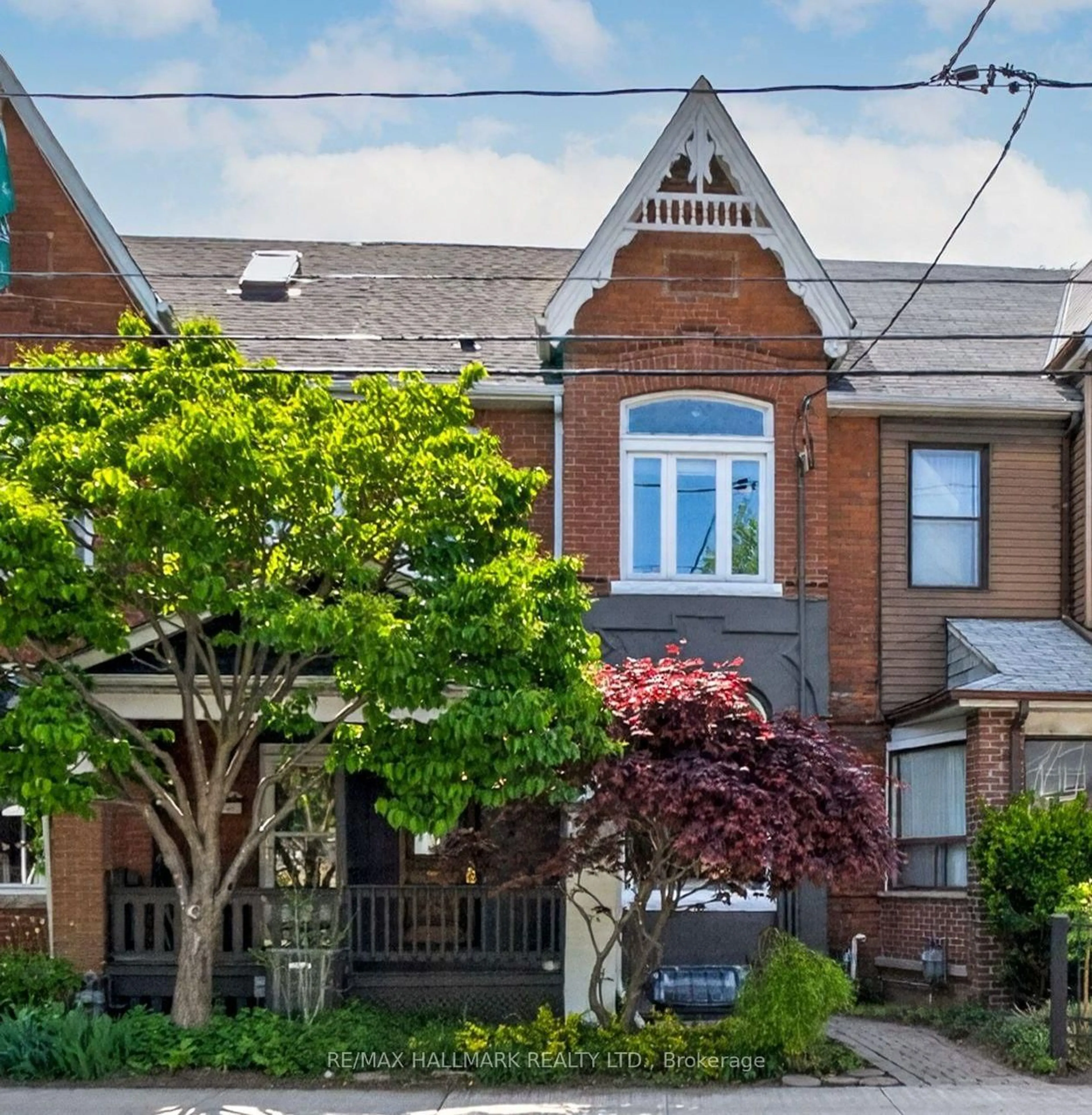 Home with brick exterior material, street for 82 Dawes Rd, Toronto Ontario M4C 5B3