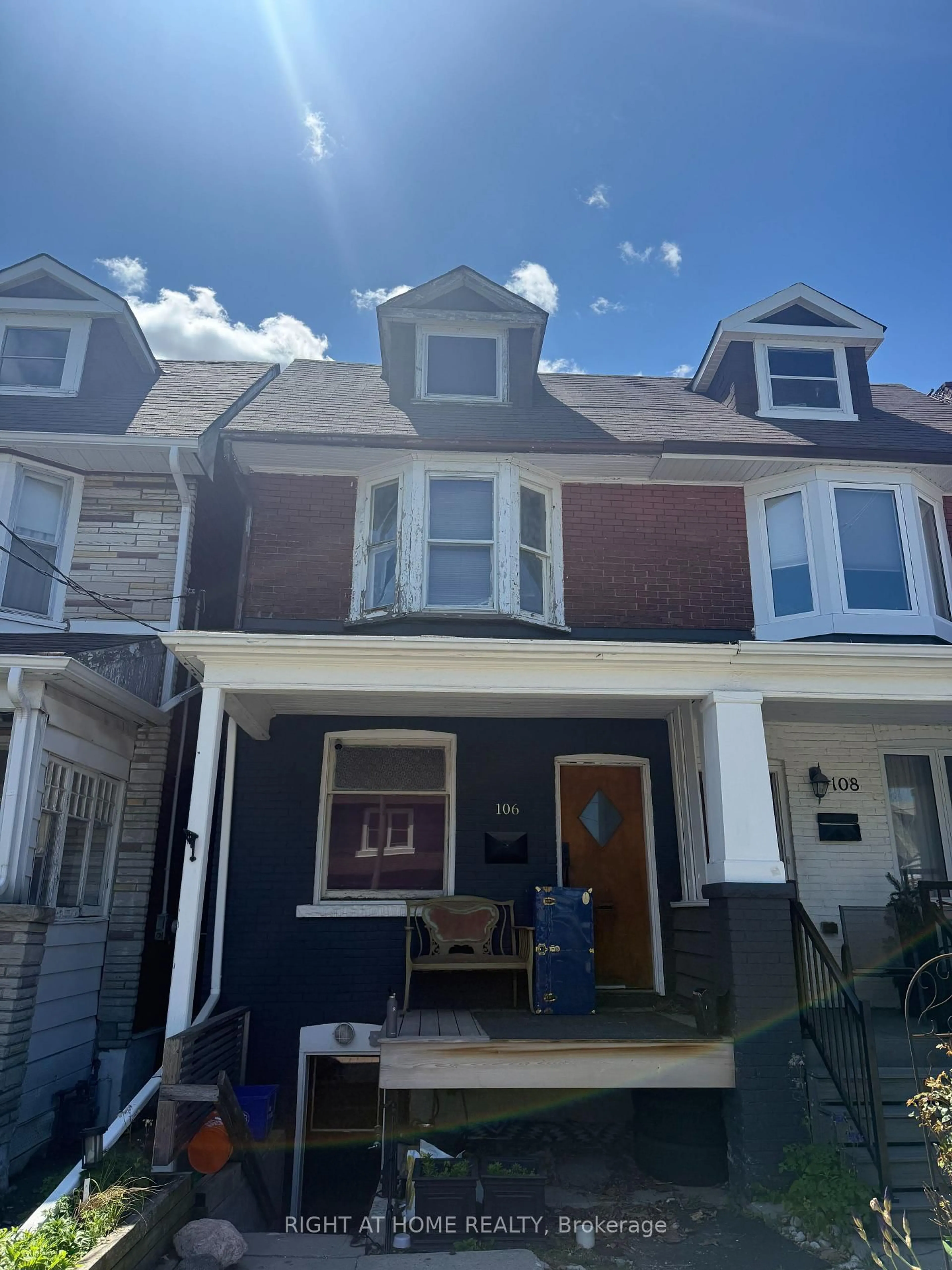 Home with vinyl exterior material, street for 106 Donlands Ave, Toronto Ontario M4J 3P1