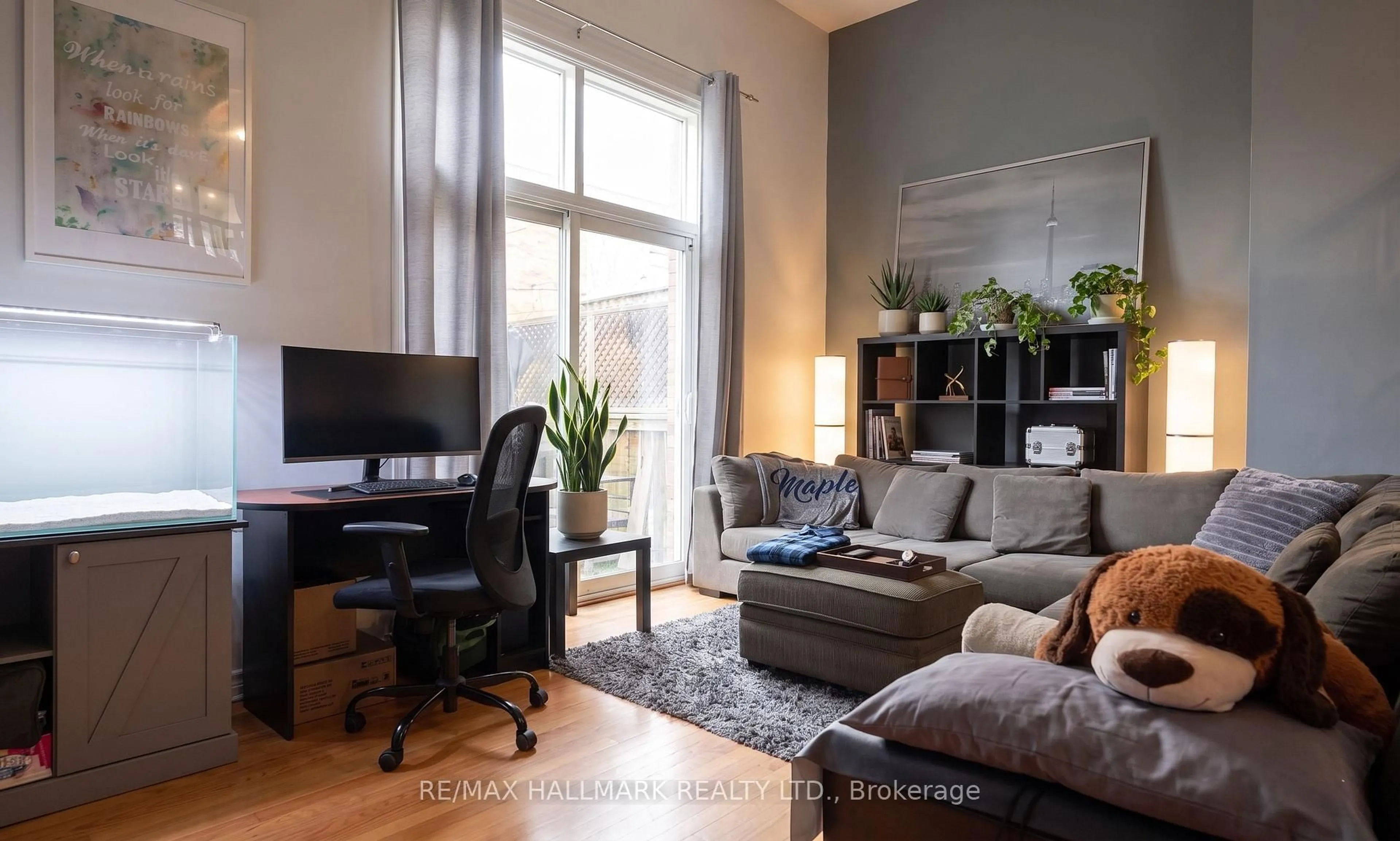 Living room with furniture, wood/laminate floor for 1330 Trowbridge Dr #42, Oshawa Ontario L1G 7L1