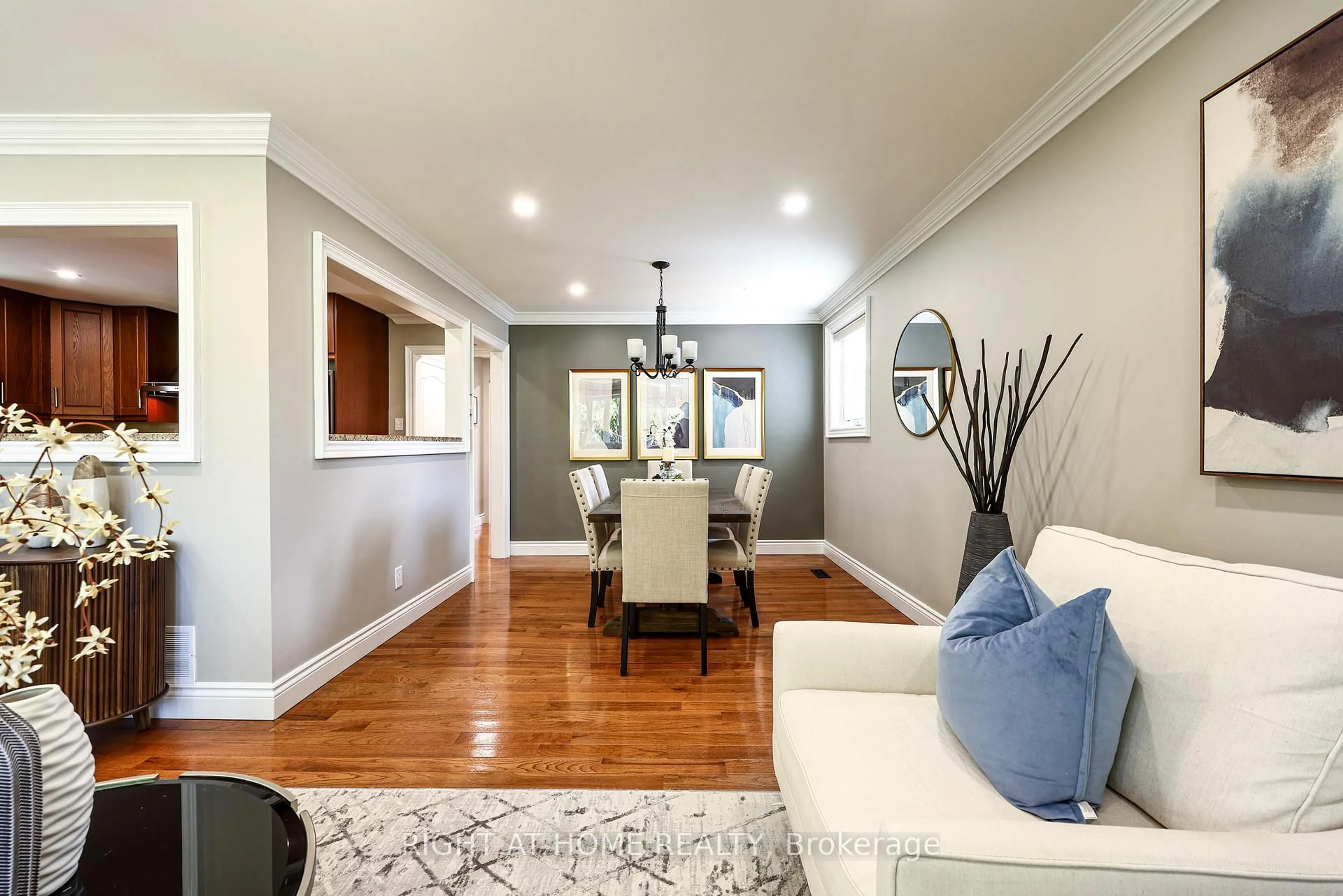 Living room with furniture, wood/laminate floor for 62 Albery Cres, Ajax Ontario L1S 2Y3