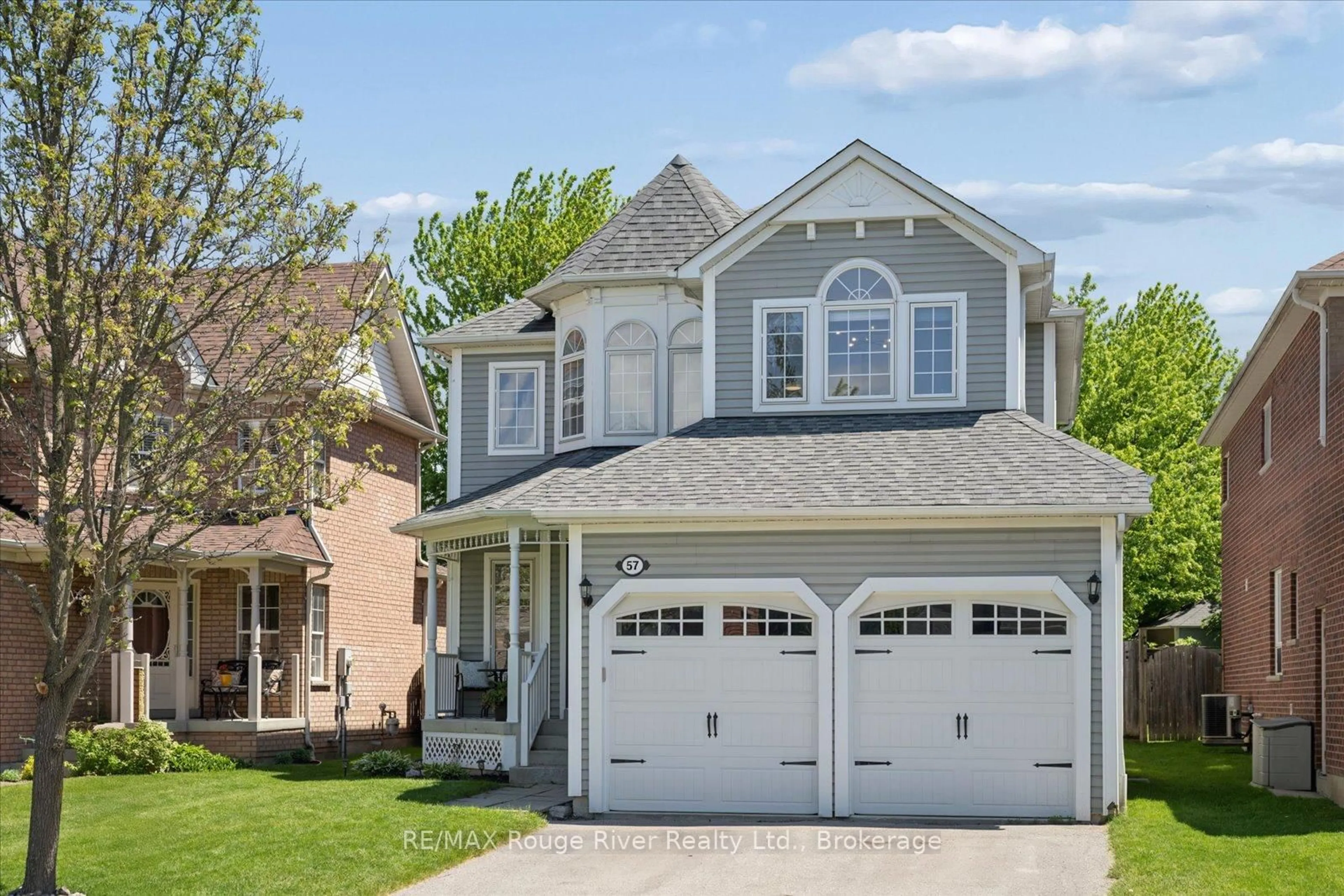 Home with vinyl exterior material, street for 57 Bayberry Crt, Whitby Ontario L1M 2L2