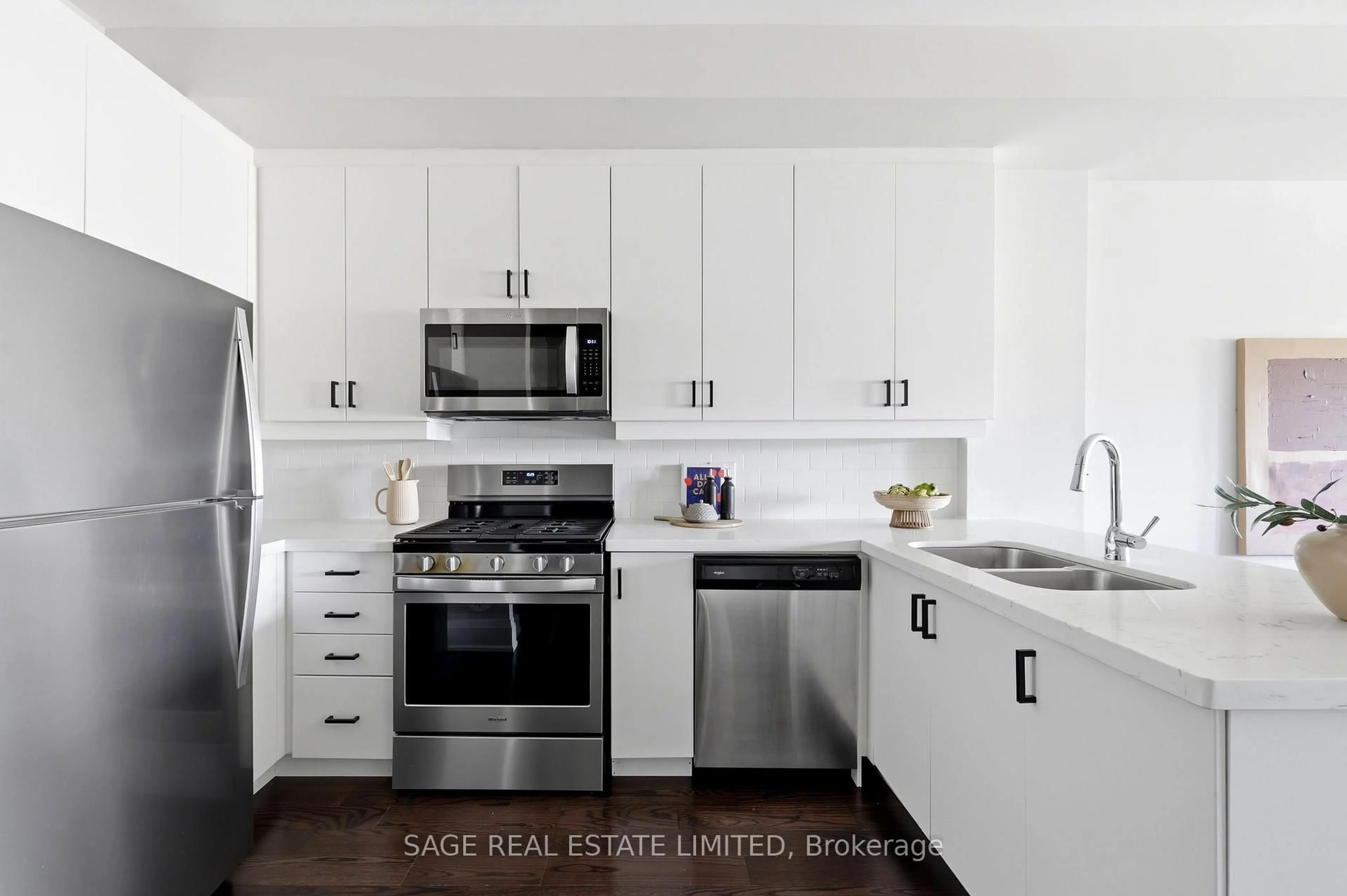 Open concept kitchen, wood/laminate floor for 6 Kalmar Ave #Th4, Toronto Ontario M1N 3G3