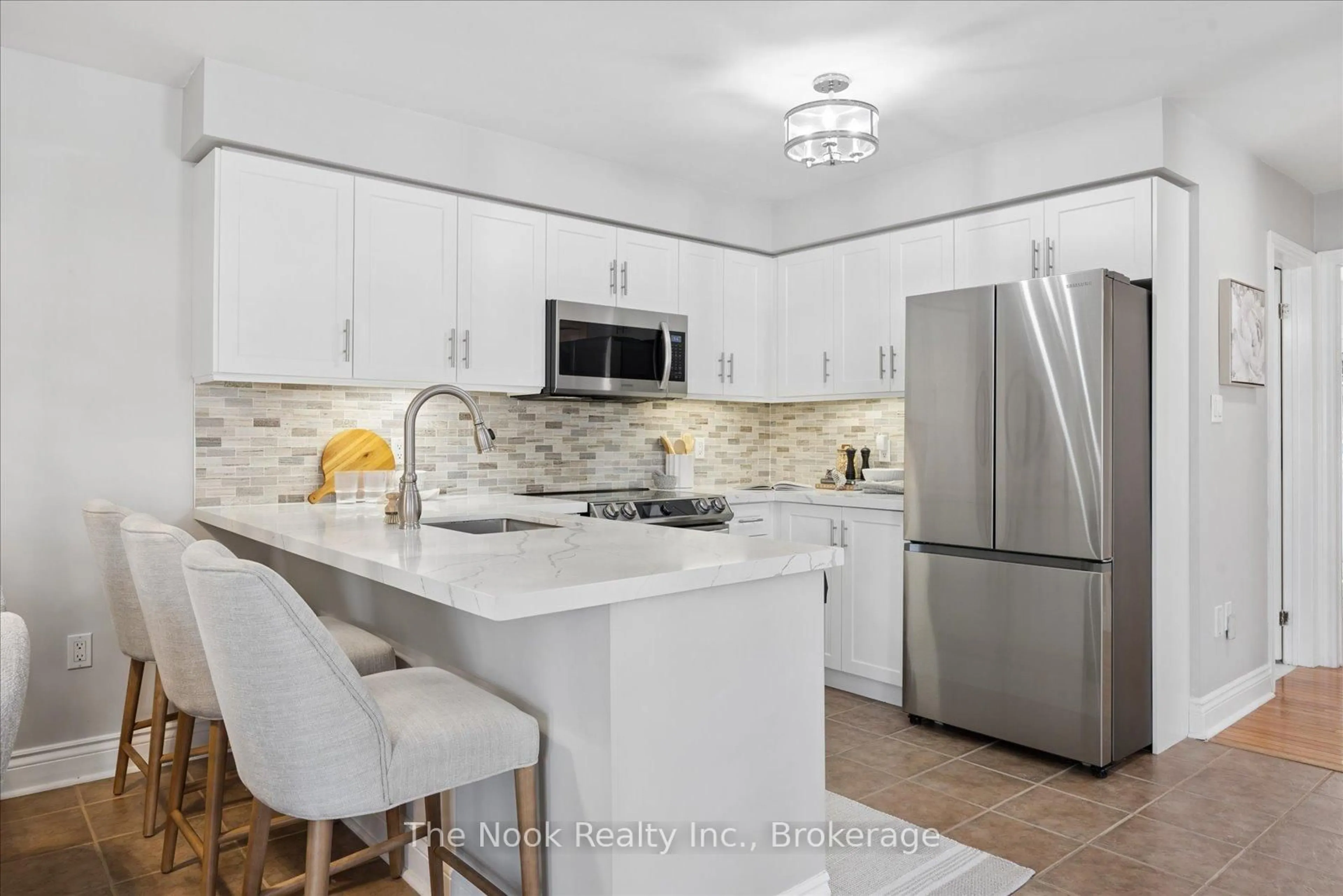 Open concept kitchen, ceramic/tile floor for 1000 Grandlea Crt, Oshawa Ontario L1K 2N1