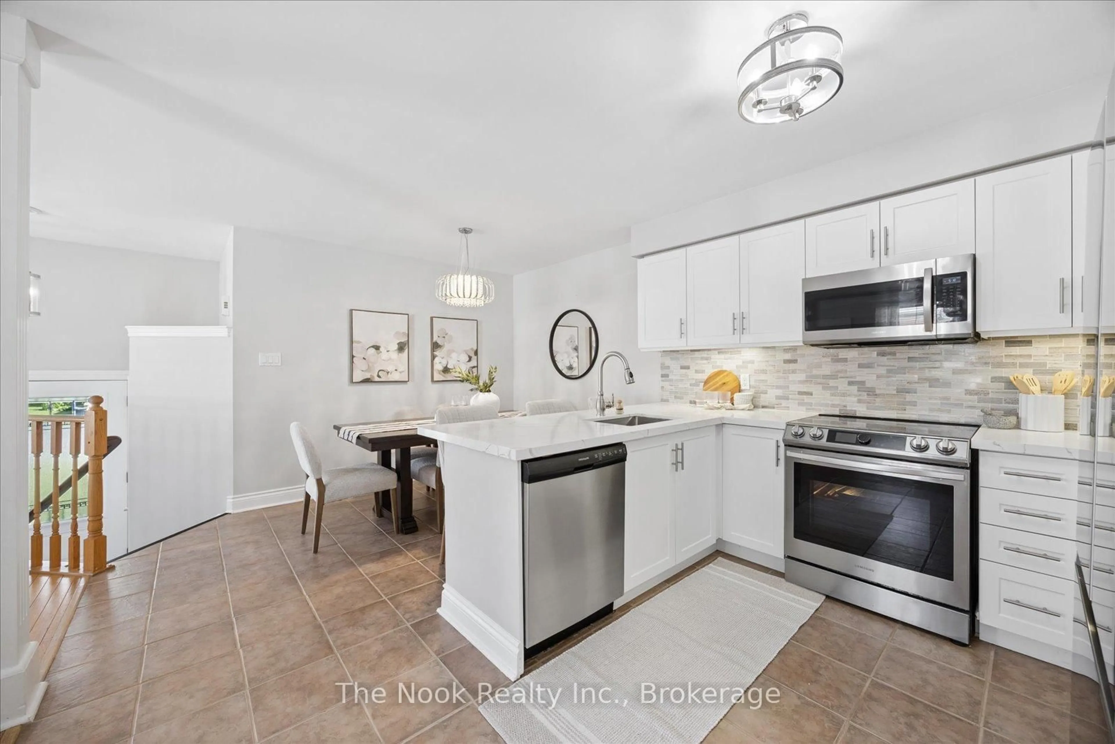 Open concept kitchen, ceramic/tile floor for 1000 Grandlea Crt, Oshawa Ontario L1K 2N1