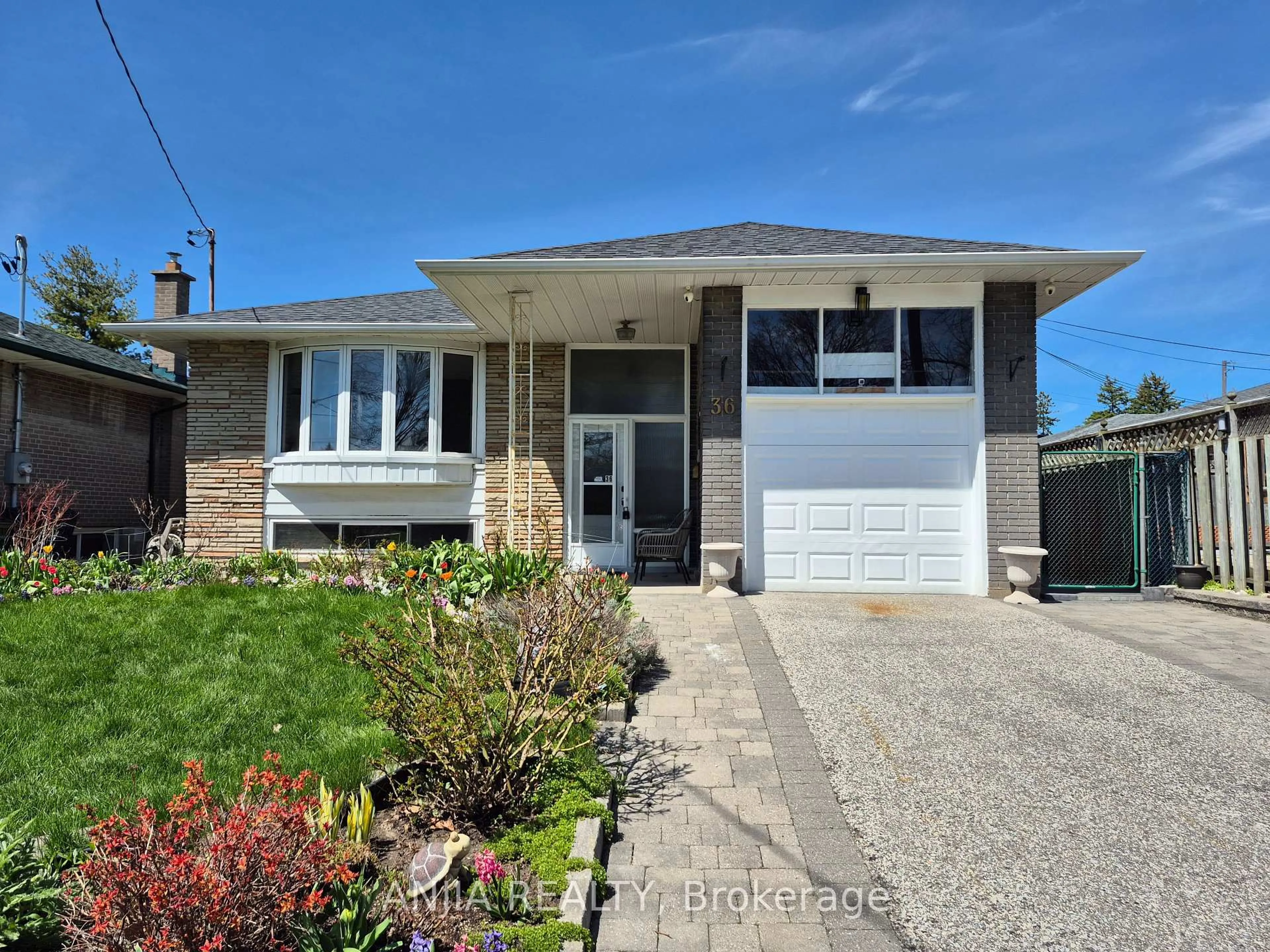Home with brick exterior material, street for 36 Birchard St, Toronto Ontario M1T 1Z2