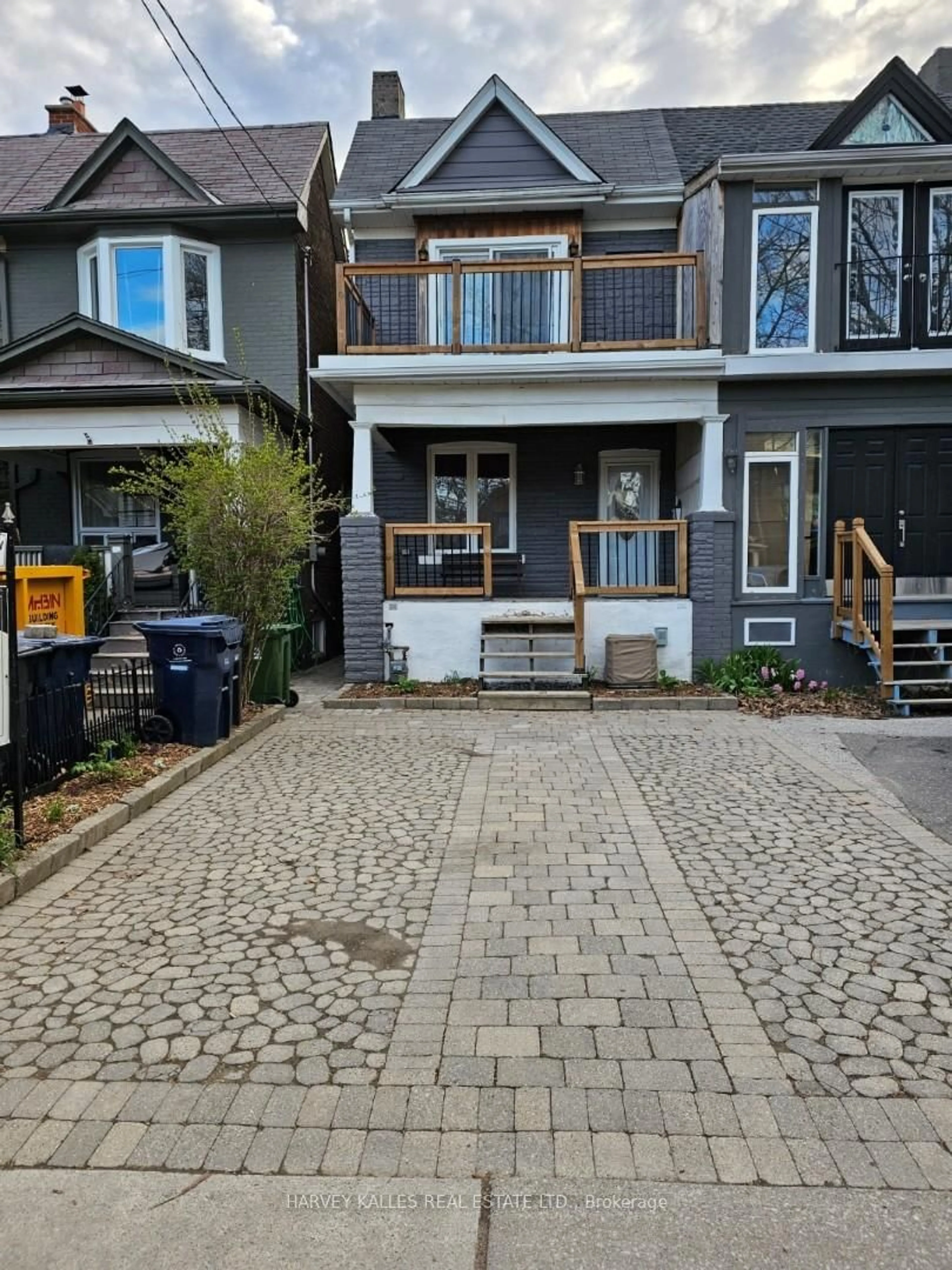 Home with brick exterior material, street for 50 Ashdale Ave, Toronto Ontario M4L 2Y7