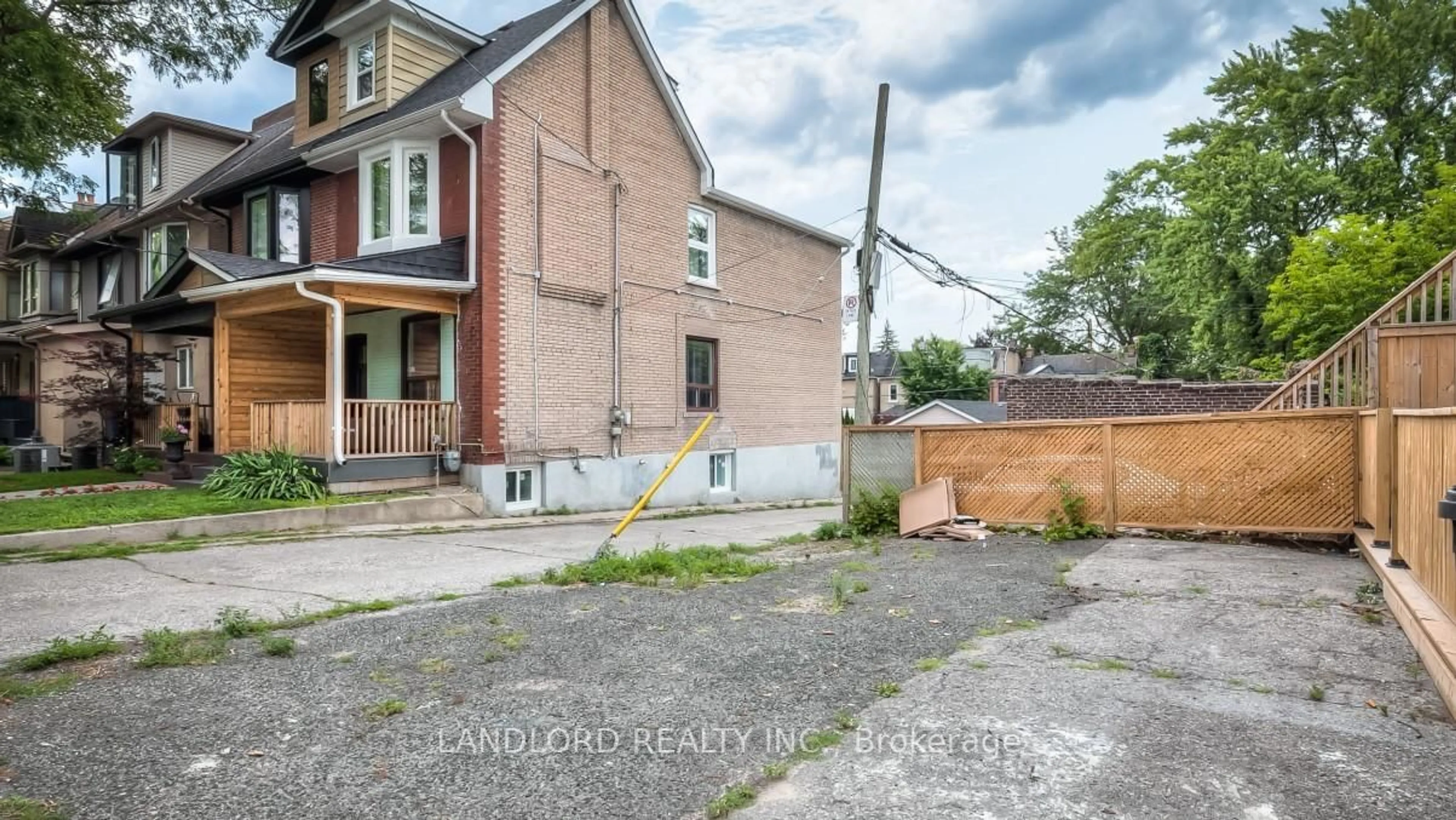 Home with brick exterior material, street for 601 Logan Ave, Toronto Ontario M4K 3B9