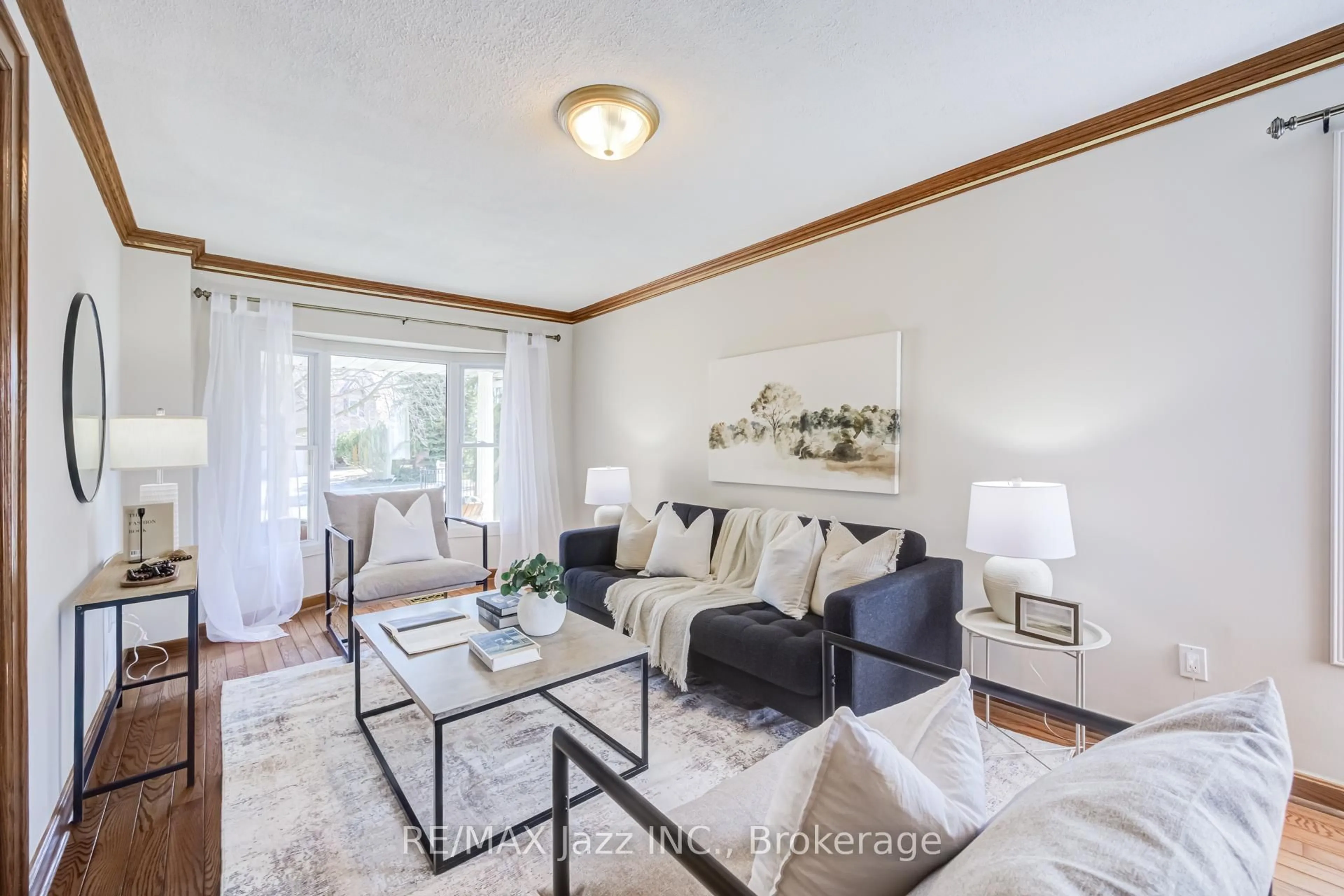 Living room with furniture, wood/laminate floor for 2 Coomer Cres, Ajax Ontario L1T 3B6