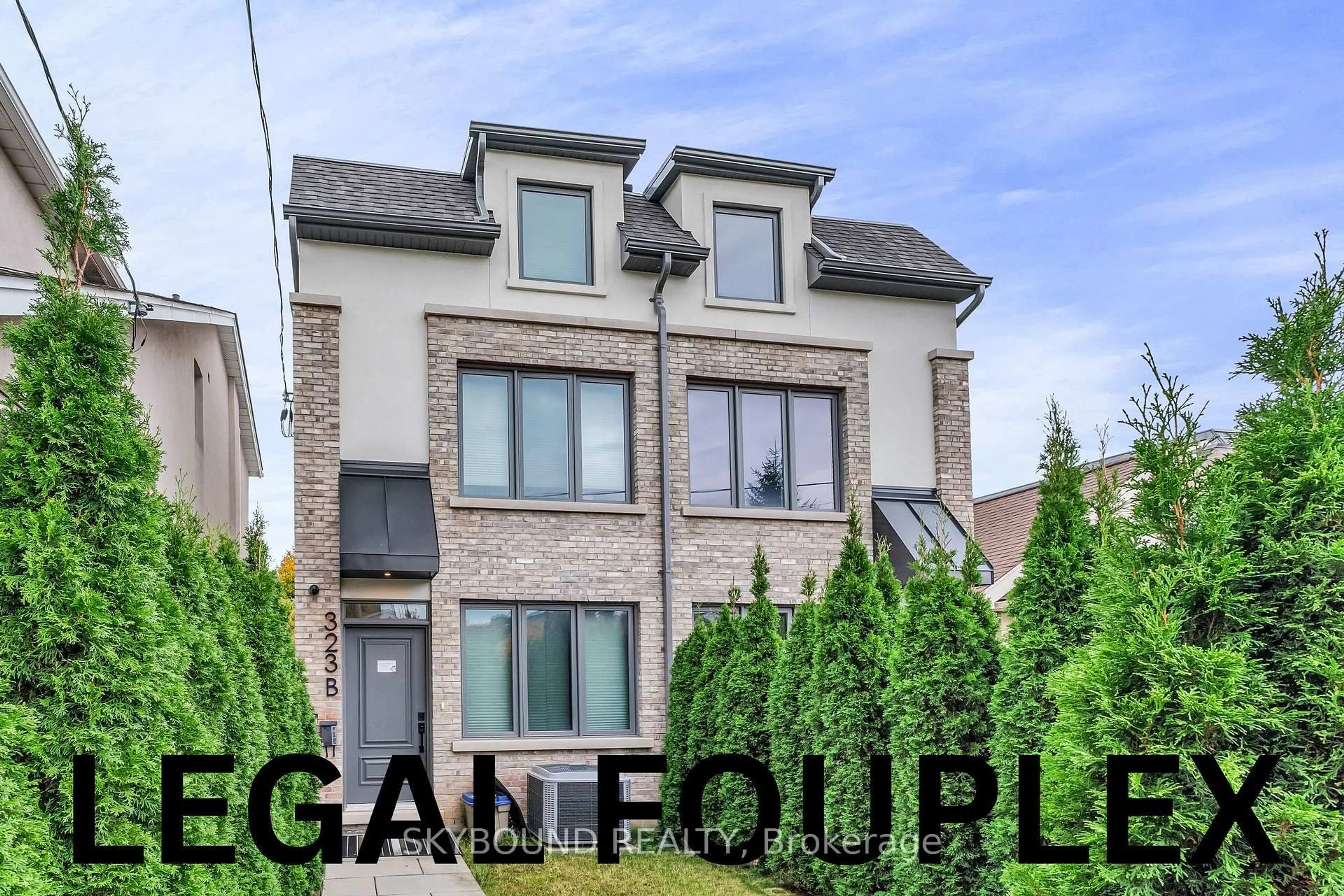 Home with brick exterior material, street for 323 Mortimer Ave, Toronto Ontario M4J 2C9
