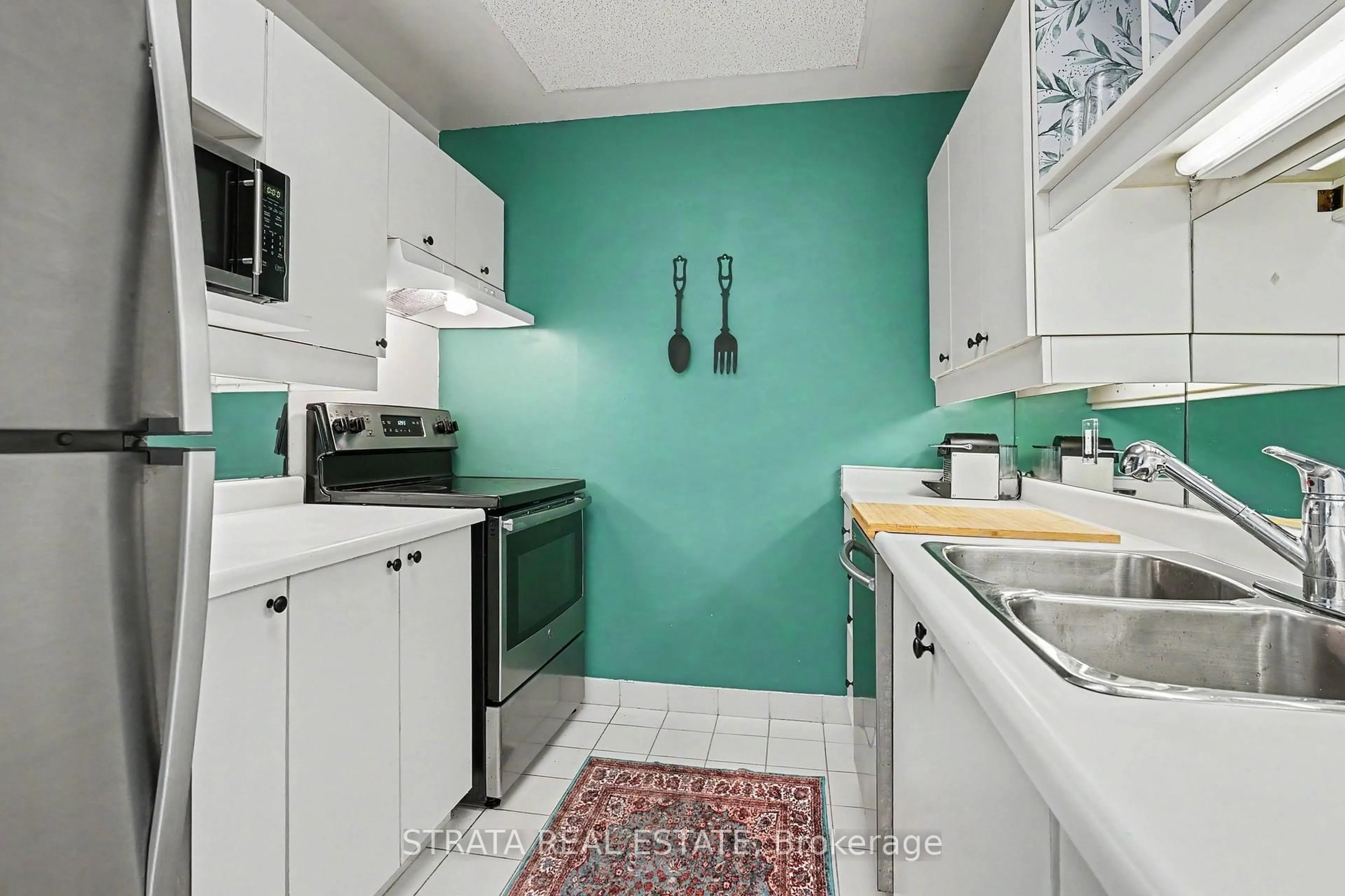 Standard kitchen, ceramic/tile floor for 300 Coxwell Ave #406, Toronto Ontario M4L 3B6