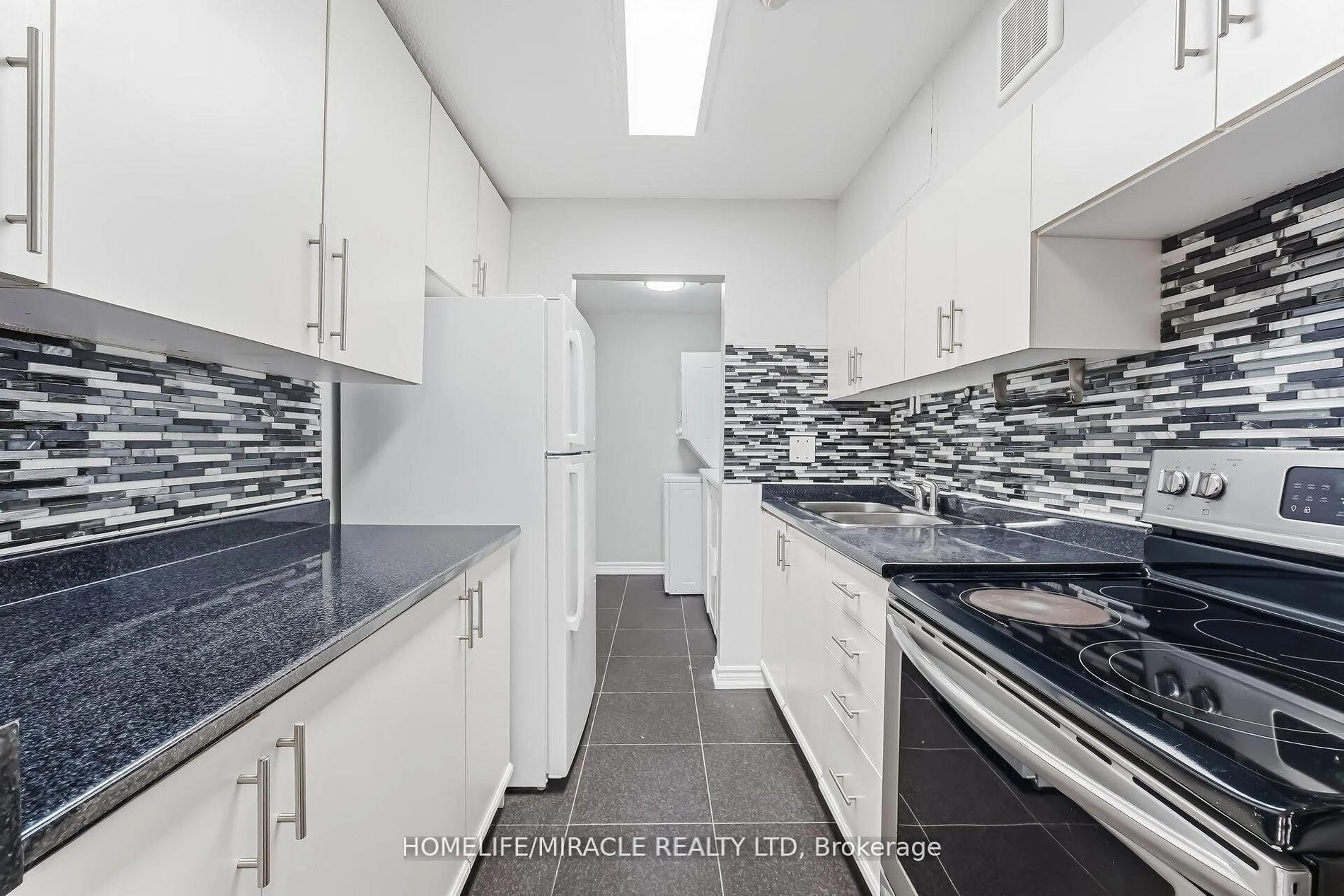 Standard kitchen, ceramic/tile floor for 140 Ling Rd #103, Toronto Ontario M1E 4V9