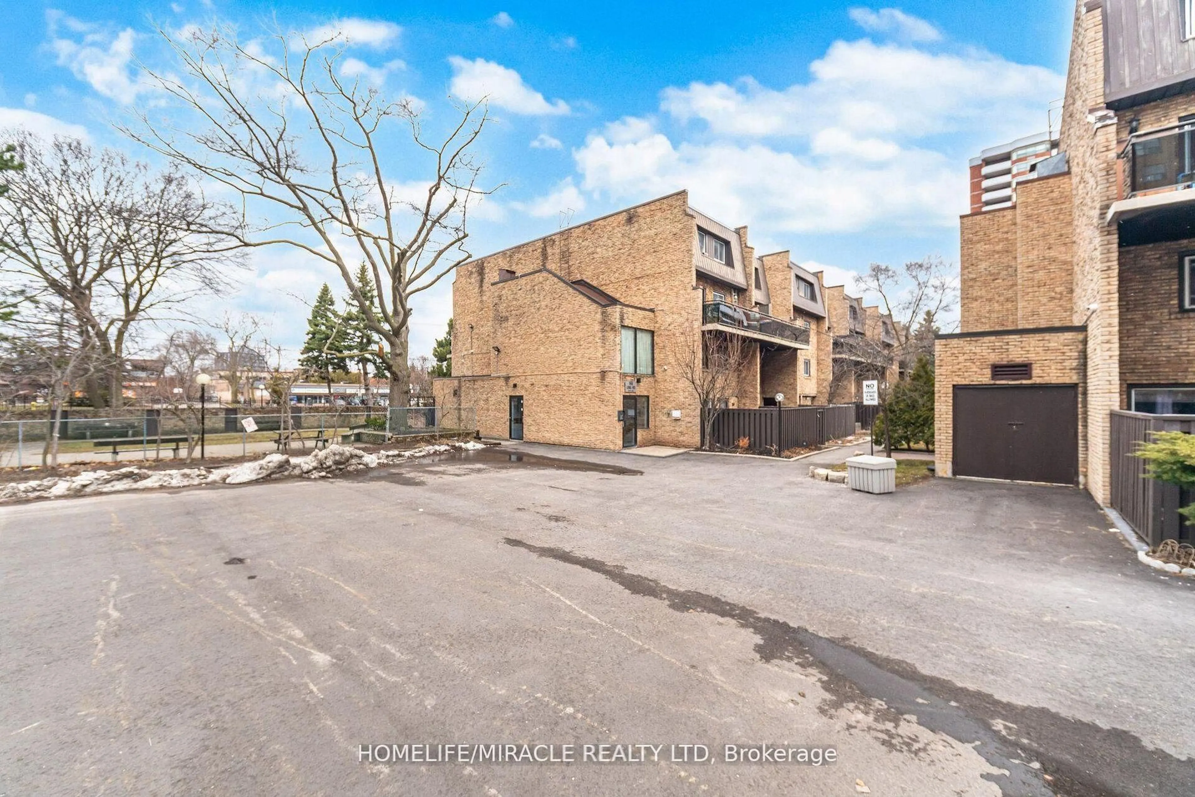 A pic from outside/outdoor area/front of a property/back of a property/a pic from drone, street for 140 Ling Rd #103, Toronto Ontario M1E 4V9